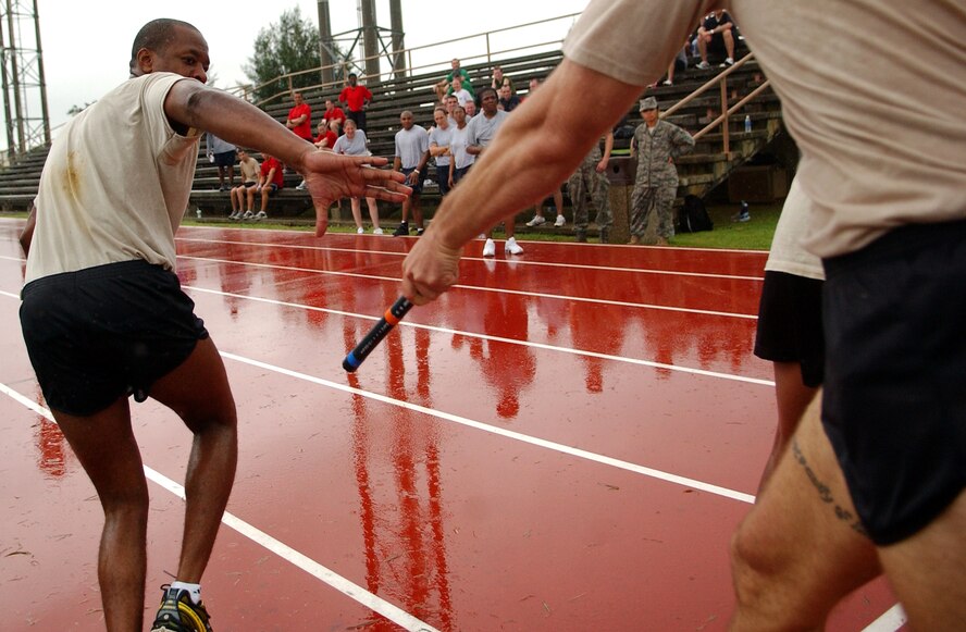 Army soldiers from the 1st Battalion Special Forces compete in a relay run during the Battle of the Services Fitness Challenge 2009 at Kadena Air Base, Japan June 26.
(U.S. Air Force photo/Tech. Sgt. Rey Ramon)          