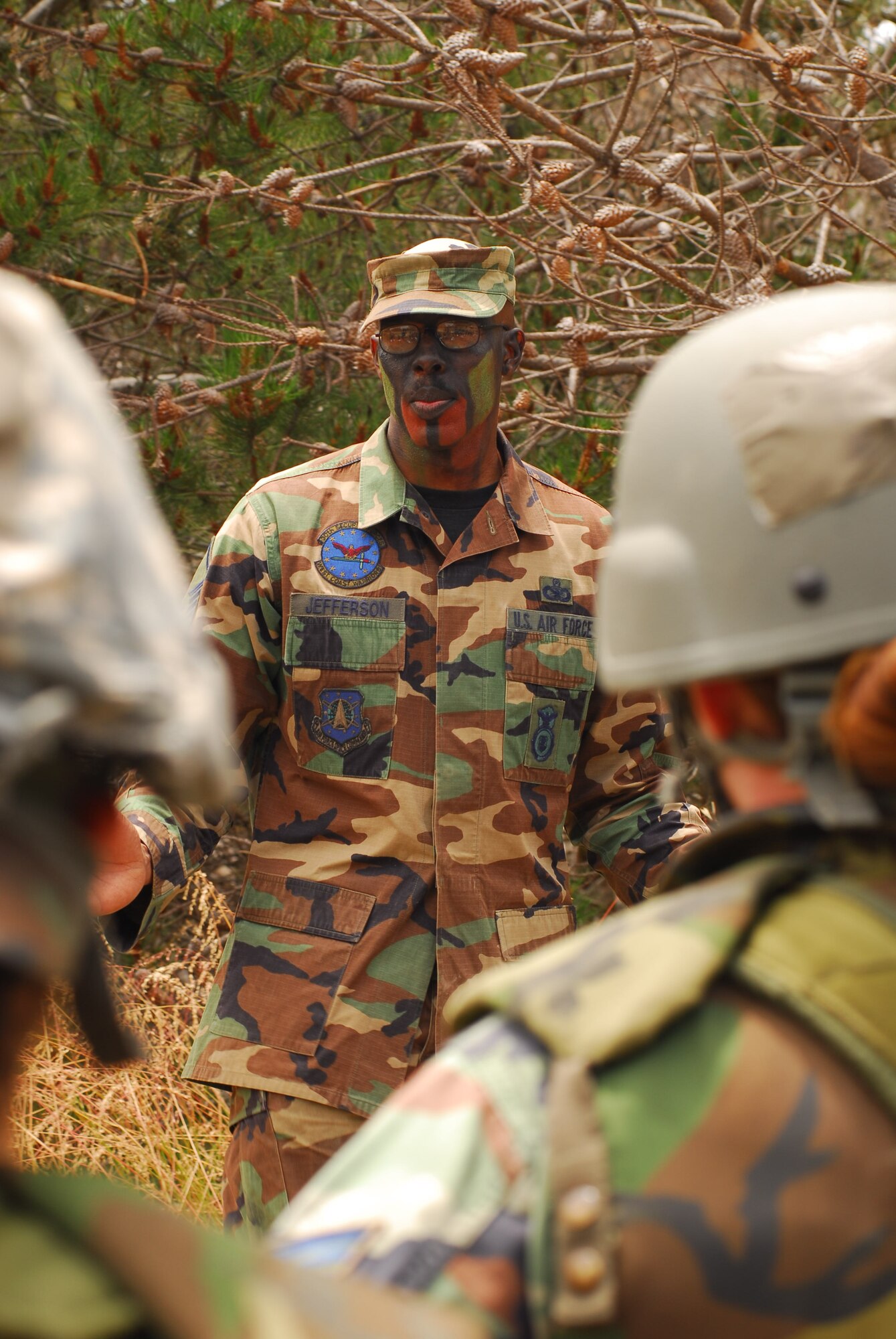 VANDENBERG AIR FORCE BASE, Calif. – With his hands-on approach to teaching, Master Sgt. Charlie Jefferson, a 30th Security Forces Squadron flight chief, instructs Airmen how to properly construct a man-made defensive fighting position at the base’s quarterly North Star exercise held here June 23-26. North Star’s overall objective is to provide tasked personnel similar pre-deployment training normally received before supporting a deployment tasking. (U.S. Air Force photo/Airman 1st Class Kerelin Molina)