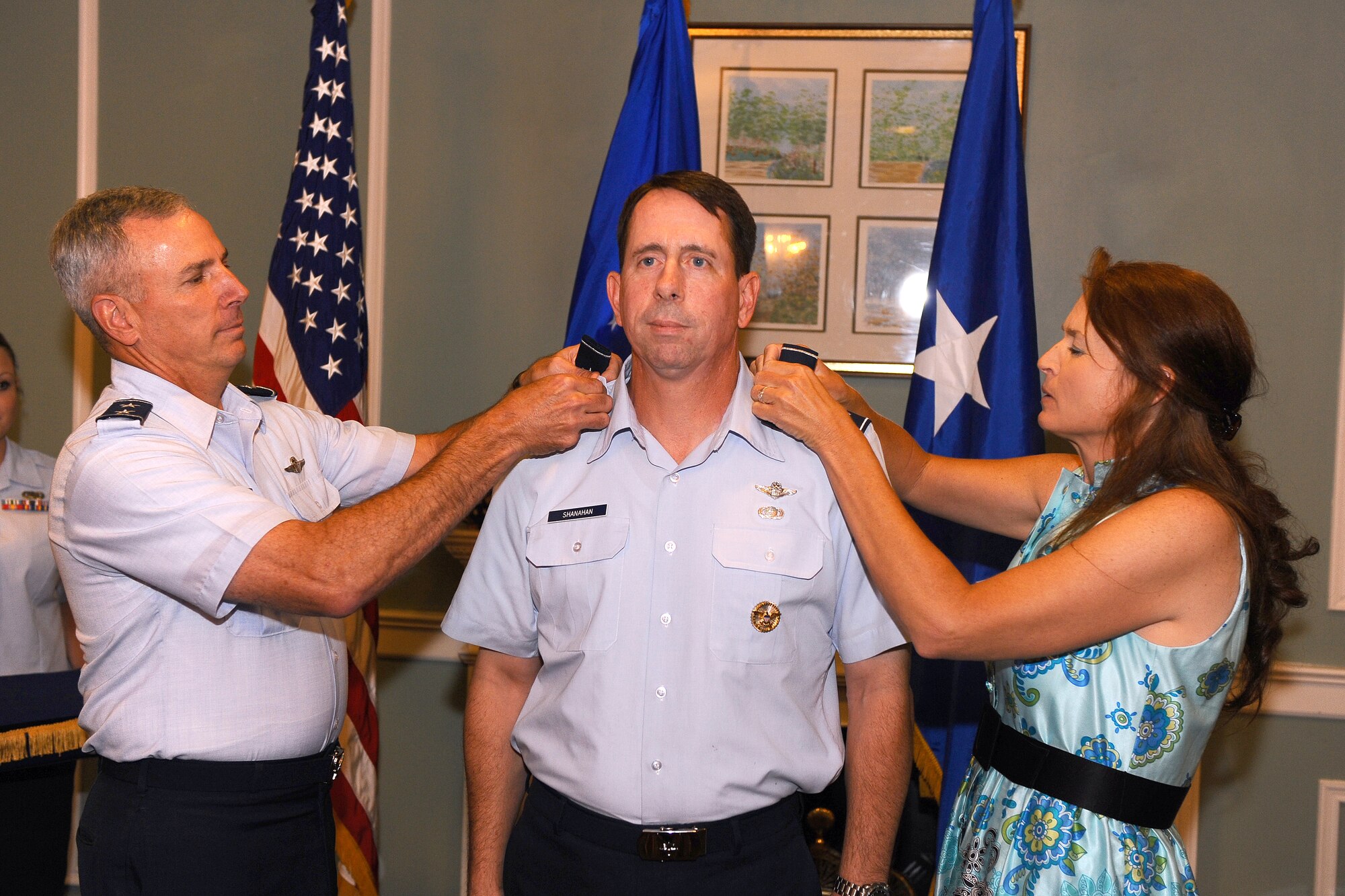 OFFUTT AIR FORCE BASE Neb. -- Maj. Gen. Floyd L. Carpenter, 8th Air Force commander, and Laura Shanahan pin on Brig. Gen. John N.T. Shanahan's first star at the official pin on ceremony at the Patriot Club June 29. General Shanahan is the 55th Wing commander and is responsible for the organizing, equipping and training the wing's men and women around the globe.

U.S. Air Force Photo by Josh Plueger
