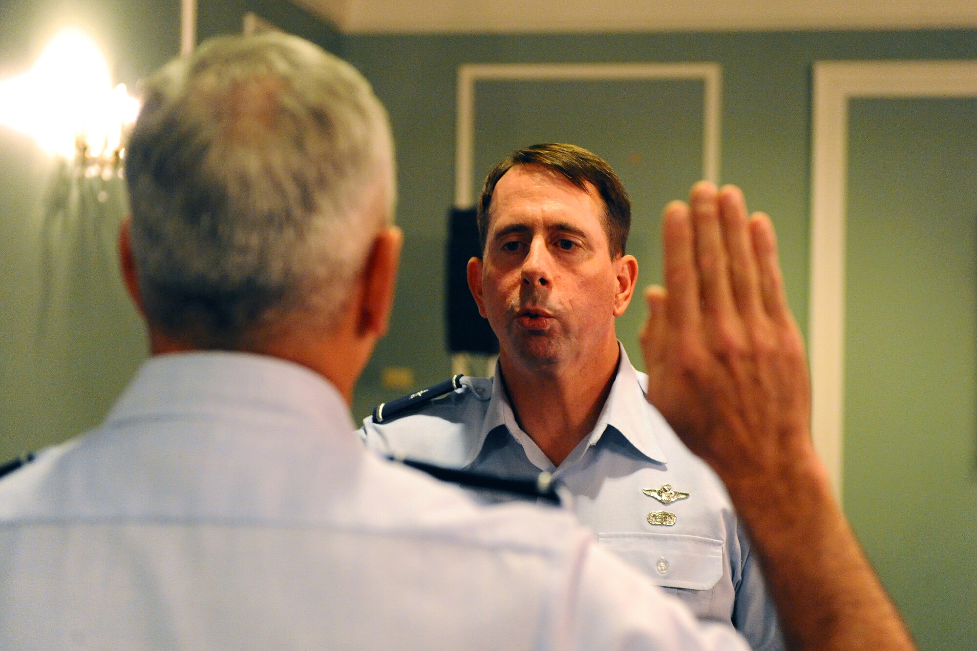 OFFUTT AIR FORCE BASE Neb.-- Brig. Gen. John N.T. Shanahan completes the Oath of Office administered by Maj. Gen. Floyd L. Carpenter at a promotion ceremony held at the Patriot Club, June 29. General Shanahan is the 55th Wing commander and is responsible for the organizing, equipping and training the wing's men and women around the globe.


U.S. Air Force Photo by Josh Plueger
