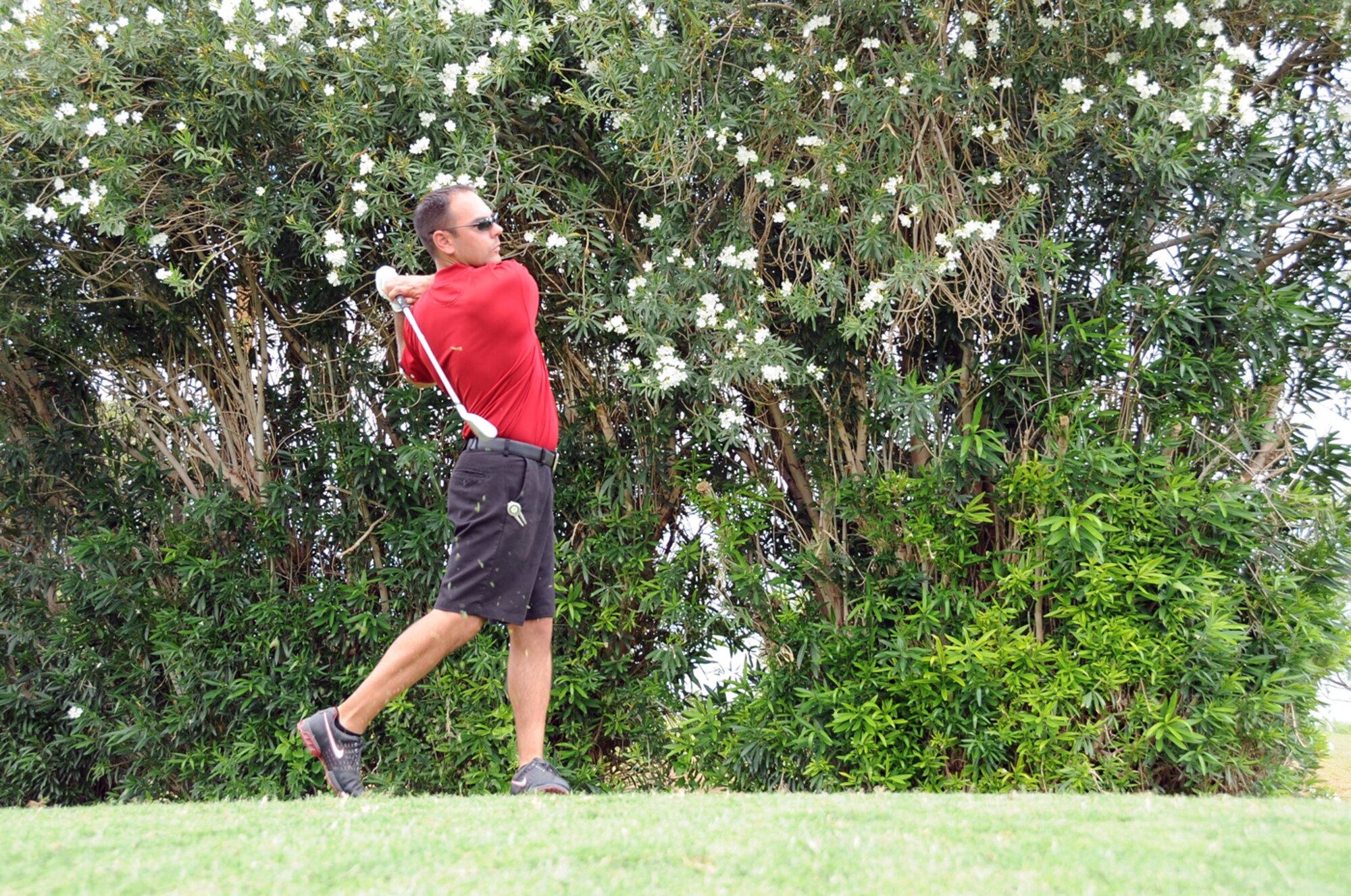 Tech. Sgt. Steve Shulski, 355th Security Forces Squadron, watches where his golf ball lands during a golf tournament here June 26. The golf tournament was a fund raiser help to support this years Senior Non-Commisioned Officer Induction Ceremony. (U.S. Air Force photo/Master Sgt. Heather Cabral)