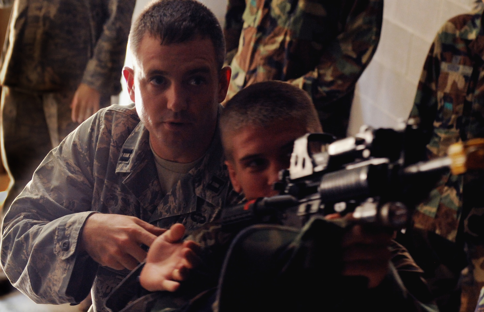 MOODY AIR FORCE BASE, Ga. -- Capt. Jason Medsger, 820th Combat Operations Squadron, talks to Cadet Andrew Zwirlen from the U.S. Air Force Academy, about situational awareness while clearing a building here June 24. The 820th Security Forces Group gave a training demonstration for the cadets. (U.S. Air Force photo by Airman 1st Class Joshua Green)