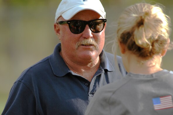 Air Force women's soccer coach Marty Buckley talks with one of his players Aug. 29, 2008. Buckley announced his retirement recently after completing his six seasons as an assistant men's coach and 17 seasons as women's soccer coach, during which time he led the Falcons to an 111-181-17 overall record. (U.S. Air Force photo/Rachel Boettcher)