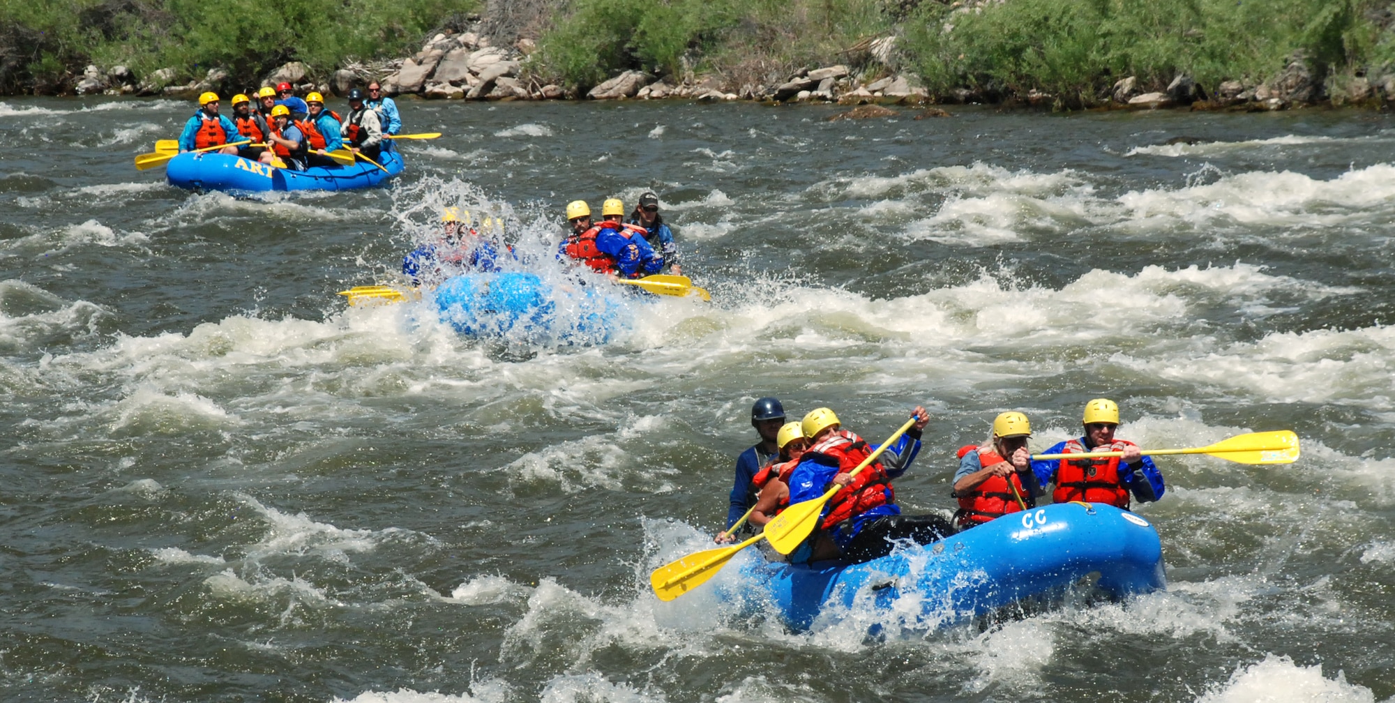 Rafters in Chaffee County, Colo., take to the white waters of the Arkansas River June 11. Snowmelt powers the river from May through late June, creating rapids that vary in difficulty from Class 2 to Class 4. (U.S. Air Force photo/Ann Patton)