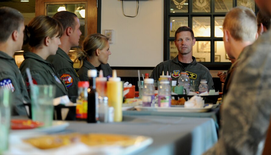 MOODY AIR FORCE BASE, Ga. -- Col. Gary Henderson, 23rd Wing commander, talks with U.S. Air Force Academy cadets at the Moody Field Club here June 25. Col. During the private lunch, Colonel Henderson gave cadets an inside perspective on what a leadership position may be like one day.  (U.S. Air Force photo by Airman 1st Class Joshua Green)