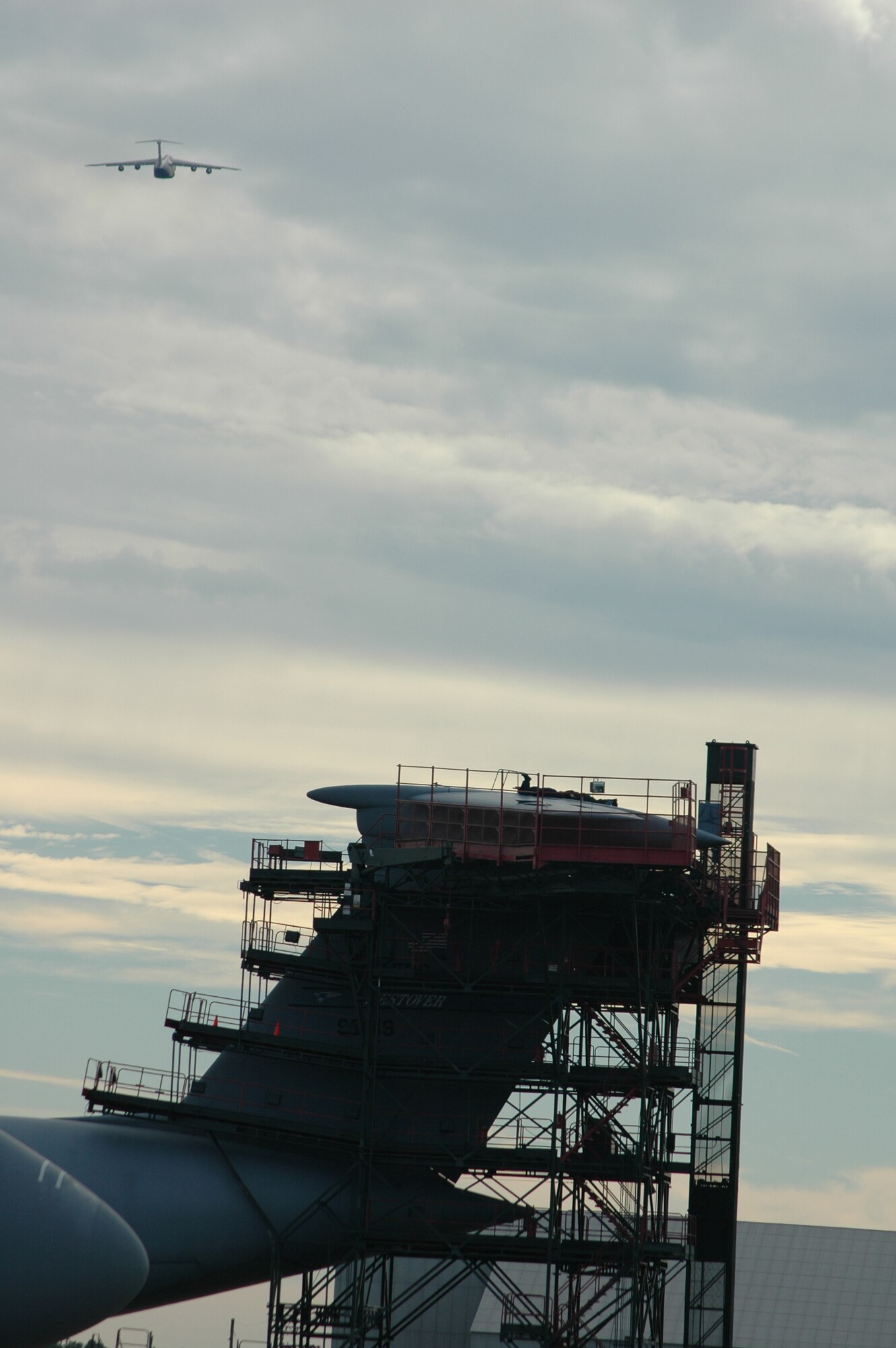 Scaffolding surrounds the tail of a Westover C-5 Galaxy undergoing Isochronal maintainence. Thirteen additional civilian workers will join the ISO staff, the Air Force announced June 25.  (US Air Force Photo/Tech. Sgt. Andrew Biscoe)