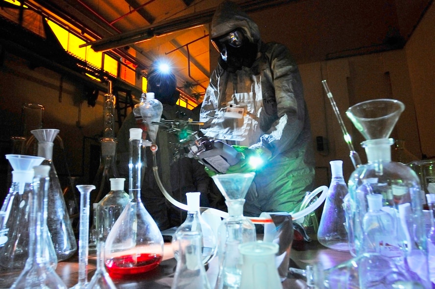 Staff Sgt. Joshua McDowell test chemicals in a simulated emergency environment during the U.S. Air Forces in Europe Chemical, Biological, Radiological and Nuclear Challenge June 23 at Ramstein Air Base, Germany. Sergeant McDowell is a 52nd Civil Engineer Squadron emergency manager. (U.S. Air Force photo/Staff Sgt. Stephen J. Otero) 