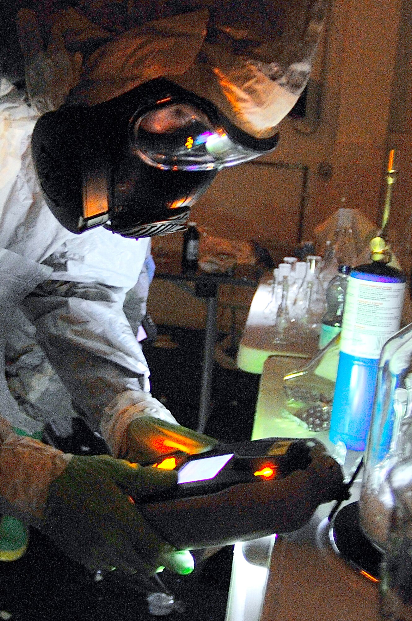 Staff Sgt. Joshua McDowell tests chemicals in a simulated emergency environment during the U.S. Air Forces in Europe Chemical, Biological, Radiological and Nuclear Challenge June 23 at Ramstein Air Base, Germany. Sergeant McDowell is a 52nd Civil Engineer Squadron emergency manager. (U.S. Air Force photo/Staff Sgt. Stephen J. Otero) 
