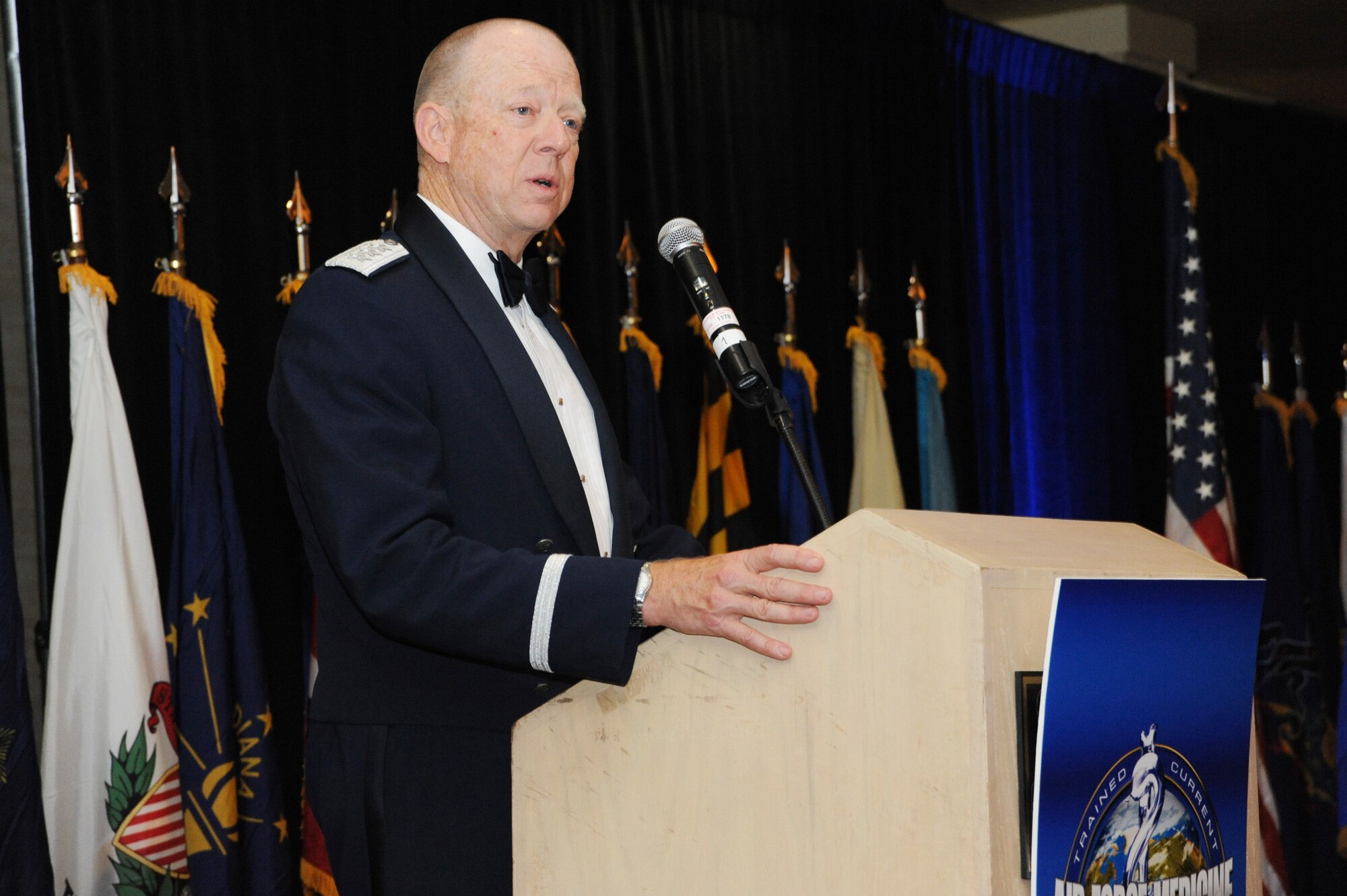 Lt. Gen. (Dr.) James G. Roudebush, surgeon general of the Air Force, speaks to a crowd of Air Force medical service personnel during a dinner ceremony in downtown San Antonio. The event marked the 60th anniversary of the Air Force medical service and included recognition of medical service personnel in attendance who had been injured in the line of duty. Several Airmen also donned Air Force uniforms displaying it's evolution since the Air Force's inception. (U.S. Air Force photo/Staff Sgt. Patrick Brown)