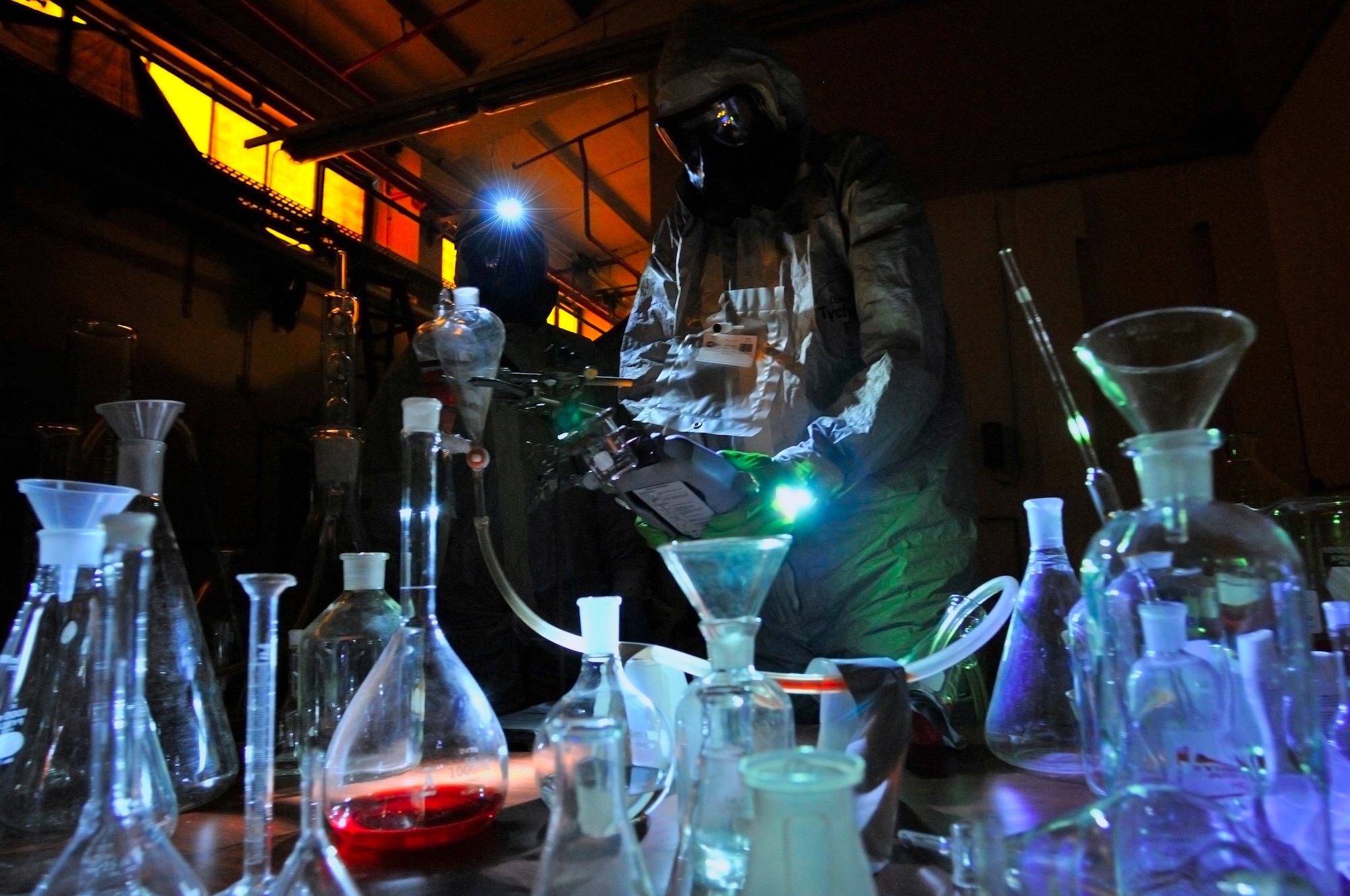 U.S. Air Force Staff Sgt. Joshua McDowell, 52nd Civil Engineer Squadron emergency manager, test chemicals in a simulated emergency environment during the United States Air Forces in Europe chemical, biological, radiological, nuclear challenge Ramstein Air Base, June 23, 2009. (U.S. Air Force photo by Staff Sgt. Stephen J. Otero)