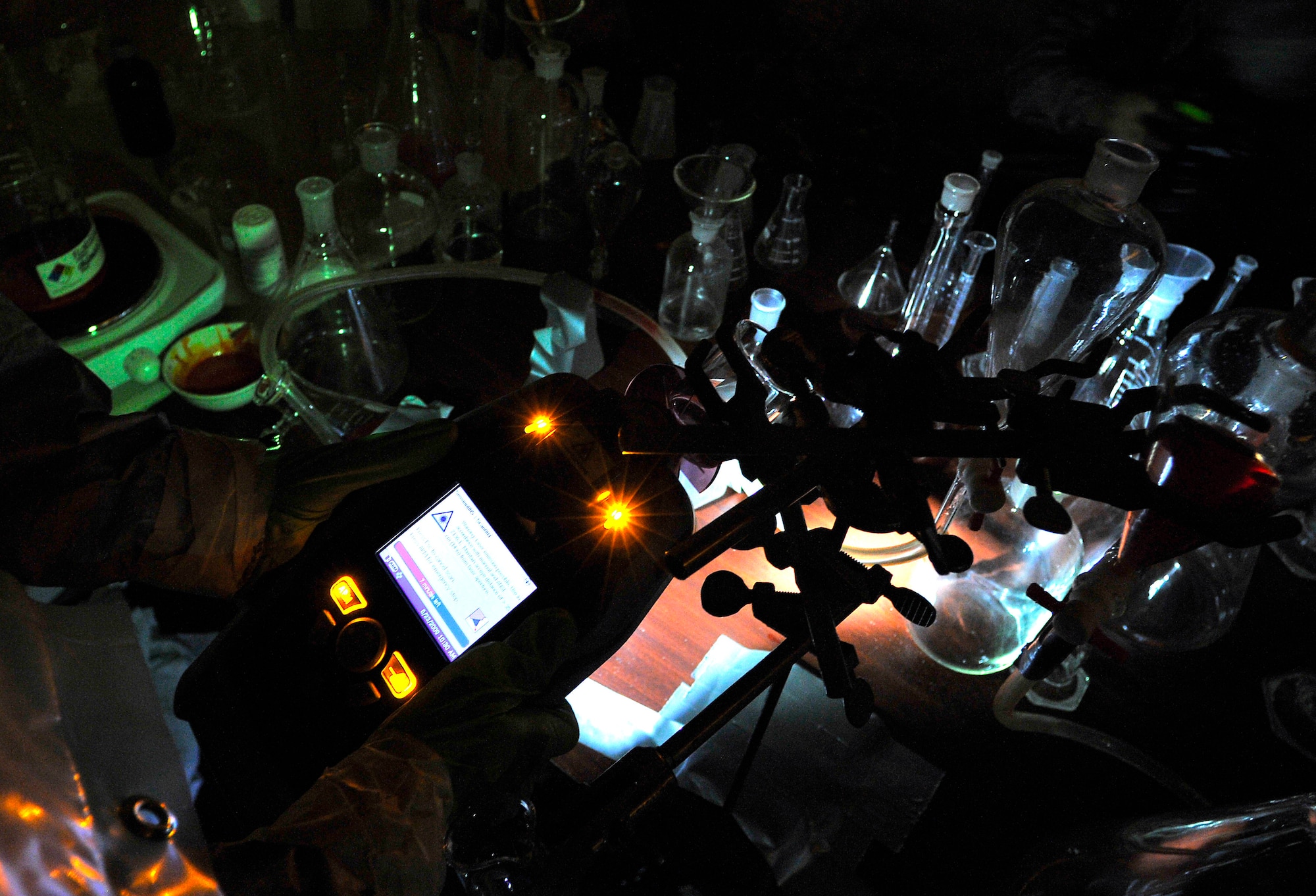 U.S. Air Force Staff Sgt. Joshua McDowell, 52nd Civil Engineer Squadron emergency manager, test chemicals in a simulated emergency environment during the United States Air Forces in Europe chemical, biological, radiological, nuclear challenge Ramstein Air Base, June 23, 2009. (U.S. Air Force photo by Staff Sgt. Stephen J. Otero)