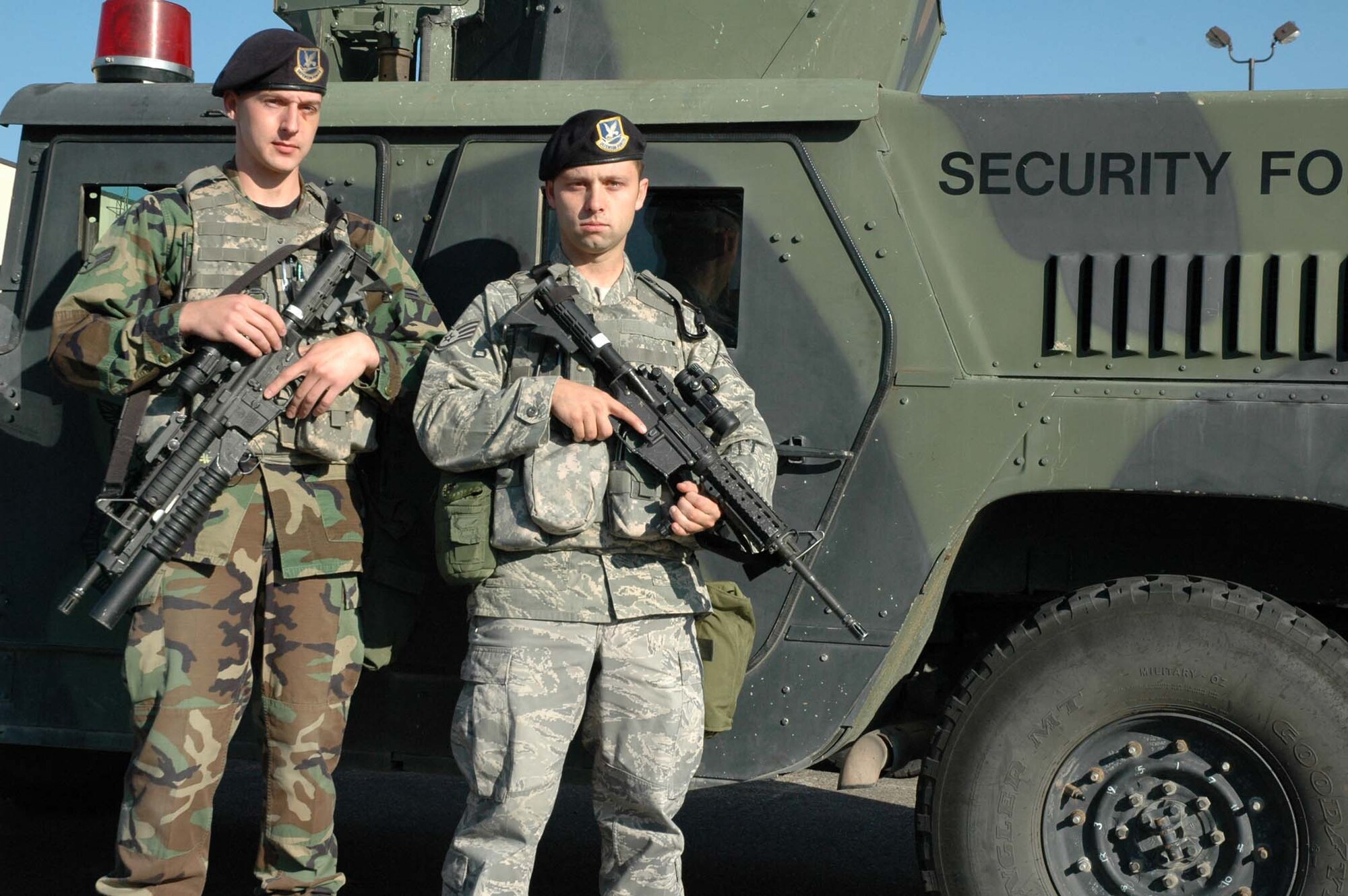 Airman 1st Class Joshua Roatch and Staff Sgt. Matthew Meade, 341st Missile Security Forces Squadron, prepare to head out to a Malmstrom missile alert facility June 22. Sergeant Meade and Airman Roatch, along with Senior Airman Jonathan Ray, also from the 341st MSFS, were instrumental in saving the life of a Hilger, Mont., man who was involved in a vehicle adccident June 6.  (U.S. Air Force photo/Senior Airman Dillon White)