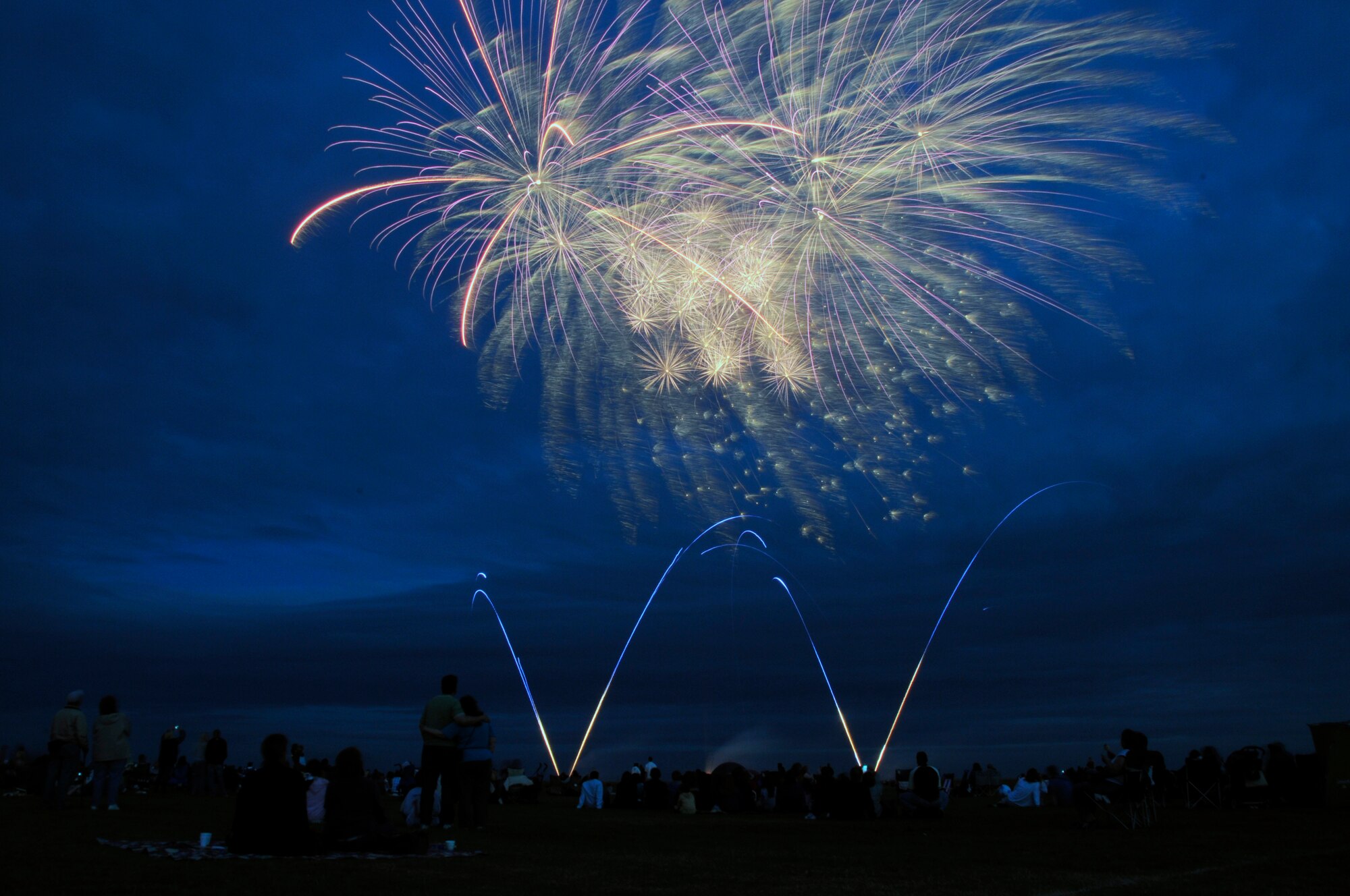 To celebrate America's Independence Day, military members and their families from RAFs Feltwell, Lakenheath and Mildenhall, as well as local British citizens, enjoy a traditional fireworks demonstration held at RAF Feltwell, England July 4, 2008.(U.S. Air Force photo by Airman First Class Perry Aston)