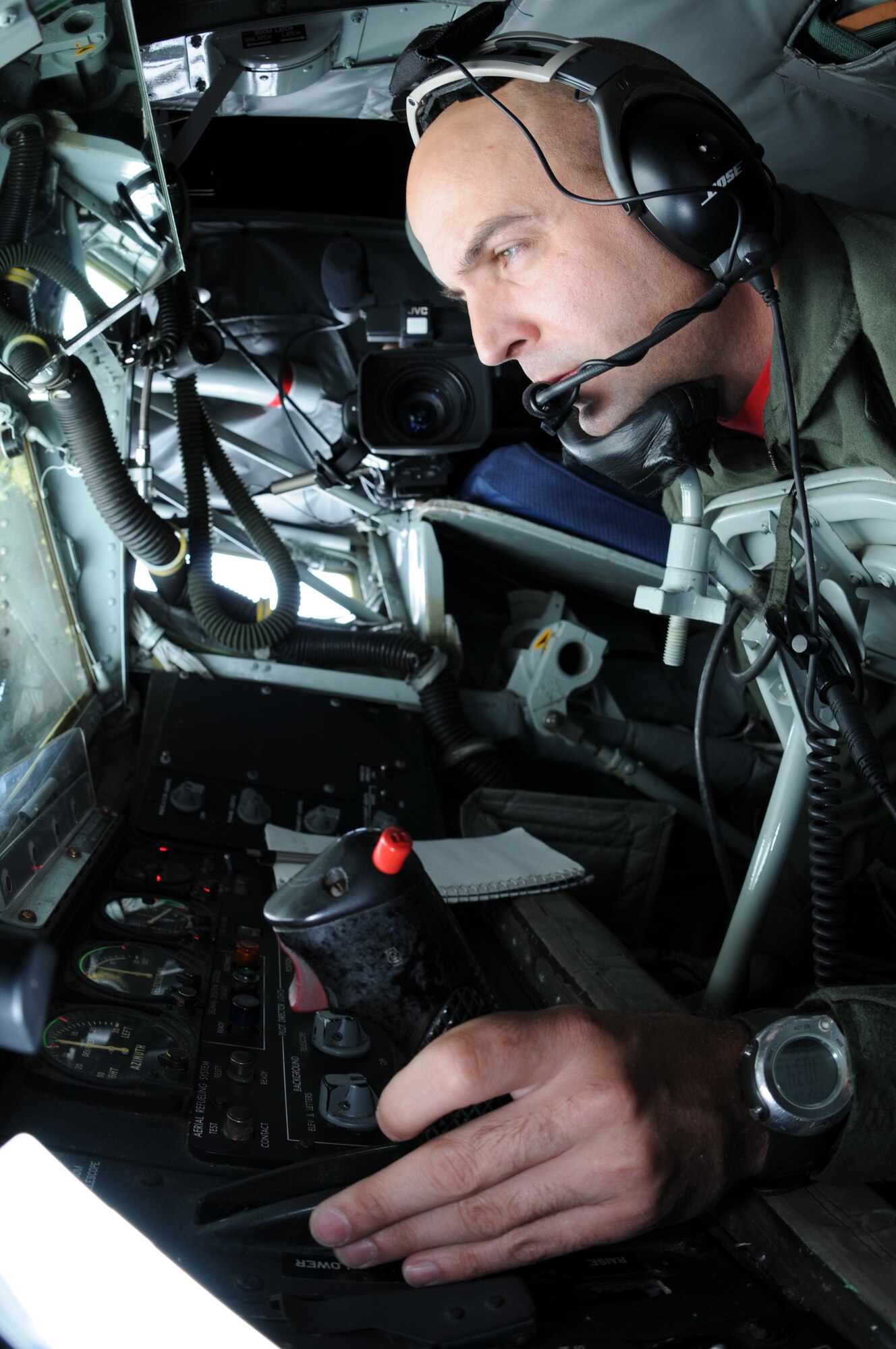 Master Sgt. Bill Fitch, 351st Air Refueling Squadron chief boom operator, refuels an MC-130P Combat Shadow from a 100th Air Refueling Wing KC-135 over the Atlantic Ocean during a sea rescue mission June 26.  The two aircraft were part of a group of five from the United States and England which participated in a mission to pluck a sick man from a ship off the coast of Ireland and deliver him to a medical treatment facility.  (U.S. Air Force photo by Staff Sgt. Austin M. May)