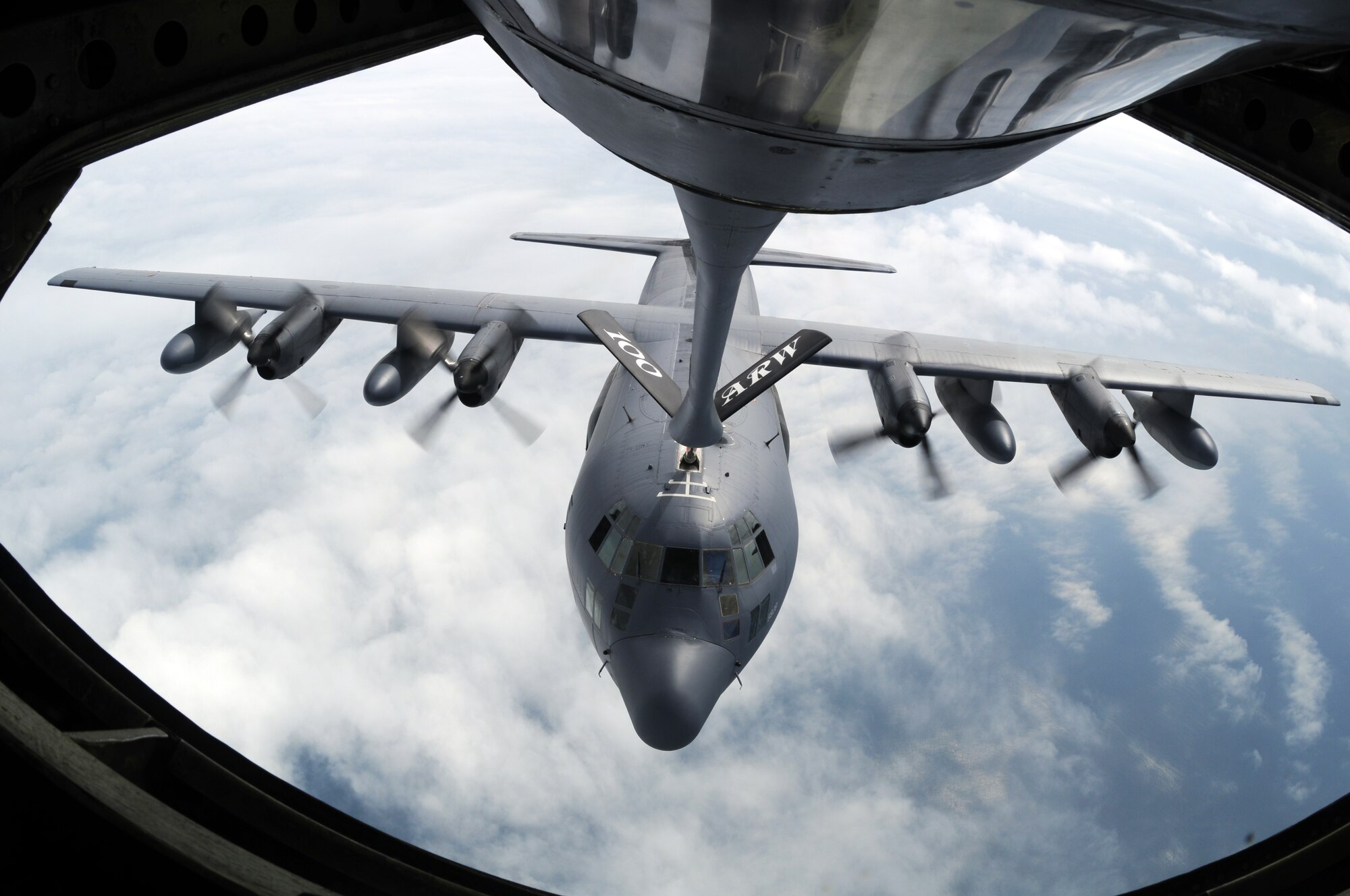 An MC-130P Combat Shadow refueling aircraft from the 352nd Special Operations Group refuels from a 100th Air Refueling Wing KC-135 over the Atlantic Ocean during a sea rescue mission June 26.  The two aircraft were part of a group of five from the United States and England which participated in a mission to pluck a sick man from a ship off the coast of Ireland and deliver him to a medical treatment facility.  (U.S. Air Force photo by Staff Sgt. Austin M. May)