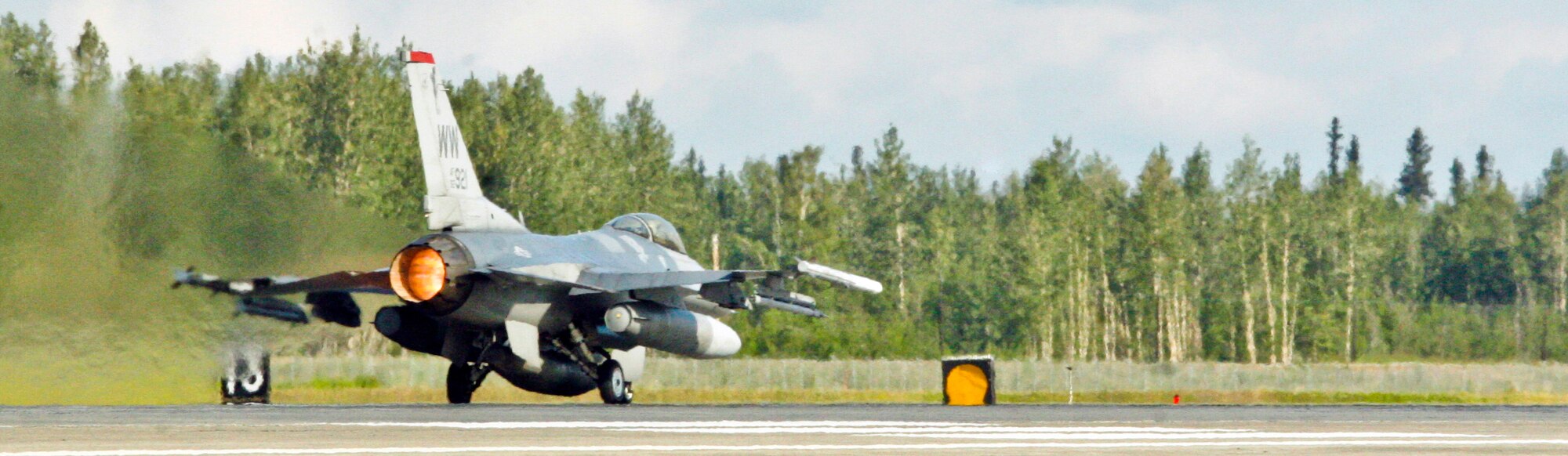 EIELSON AIR FORCE BASE, Alaska - An F-16 from Misawa Air Base, Japan takes off from the flightline here to participate in a join-training mission in the gulf of Alaska June 25, 2009. The jet was one of several from Misawa participating in Exercise Northern Edge 2009. (U.S. Marine Corps photo by Lance Cpl. Ryan A. Rholes) (Released)