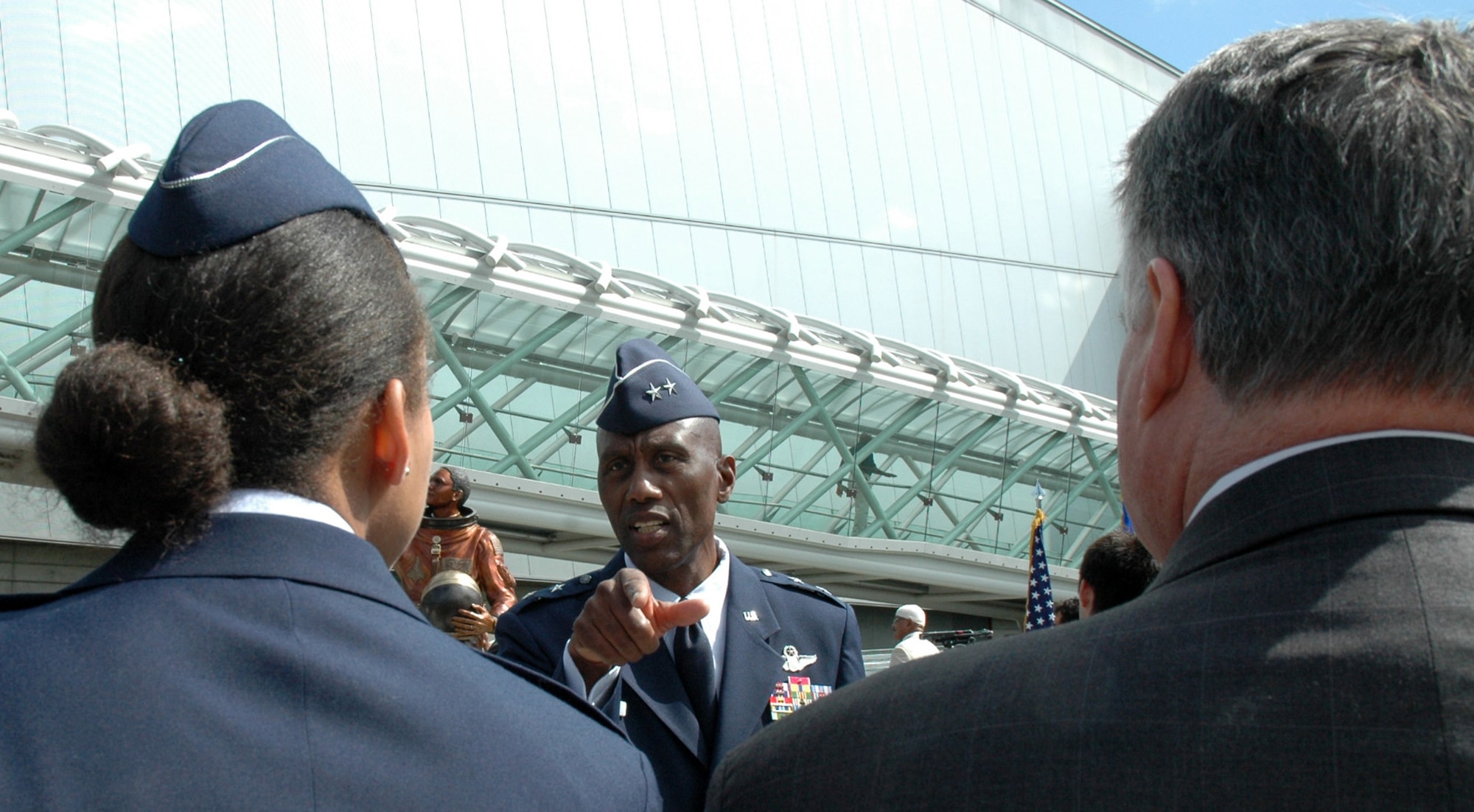 Maj. Gen. Harold "Mitch" Mitchell, center, mobilization assistant to the Commander, U.S. Transportation Command, Scott Air Force Base, Ill., was one of the presenters during the Lt. Col. Michael Anderson memorial and aerospace scholarship foundation at the Museum of Flight in Seattle, June 26. General Mitchell also coordinated the event.