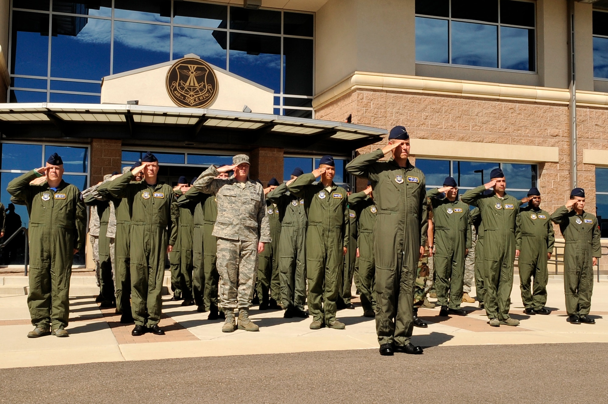 The 2nd Space Warning Squadron renders their first salute to incoming commander, Lt. Col. Jennifer Jenkins, during a change of command ceremony here, June 26. (U.S. Air Force photo by: Senior Airman Steven Czyz)