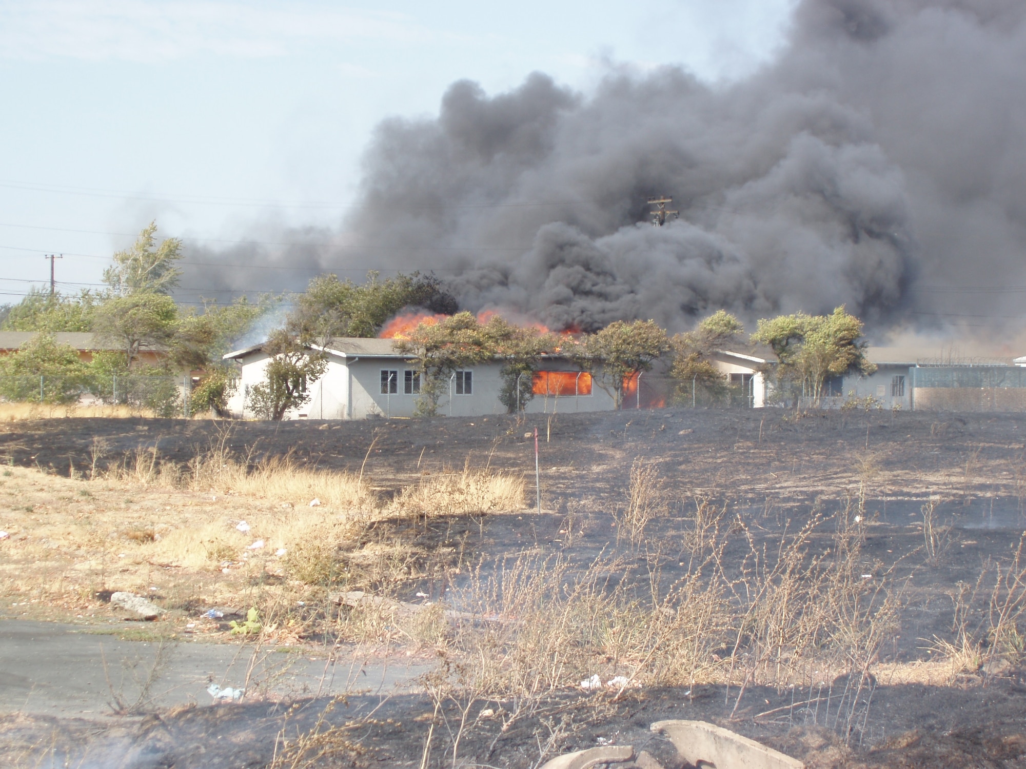 The Aug. 24, 2008 wildfire destroyed 176 vacant homes on base and took  the efforts of 225 firefighters to extinguish the blaze. (U.S. Air Force photo)