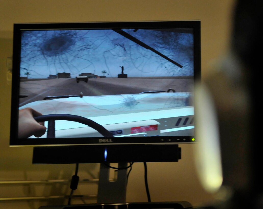 Senior Airman Joseph Vargas, a pharmacy technician with the 779th Medical Support Squadron, uses the Virtual Iraq program at Malcolm Grow Medical Center's Virtually Better training site on Andrews Air Force Base, Md. on June 25, 2009. The program uses exposure therapy to help the patient confront and overcome the incidents that scarred them. (U.S. Air Force photo by Senior Airman Renae Kleckner)(released)