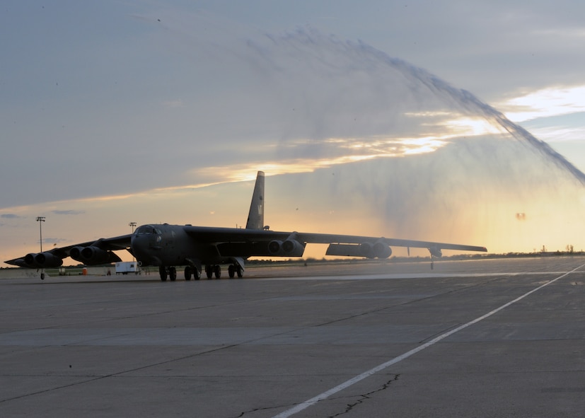 MINOT AIR FORCE BASE, ND -- A B-52 Stratofortress with Col. Parker Northrup III, 5th Operations Group commander, onboard is sprayed down after his final B-52 flight here Jun 29. Colonel Northrup is leaving Minot for a new assignment at the Defense Threat Reduction Agency in Ft. Belvoir, Va. (U.S. Air Force photo by Staff Sgt. Keith Ballard) 