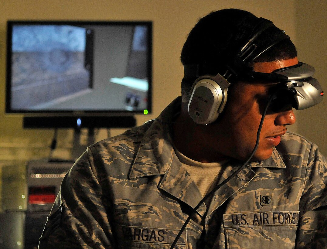 Senior Airman Joseph Vargas, a pharmacy technician with the 779th Medical Support Squadron, uses the Virtual Iraq program at Malcolm Grow Medical Center's Virtually Better training site on Andrews Air Force Base, Md. on June 25, 2009. Exposure therapy is a type of therapy that helps patients confront and overcome the incidents that scarred them. (U.S. Air Force photo by Senior Airman Renae Kleckner)(released)