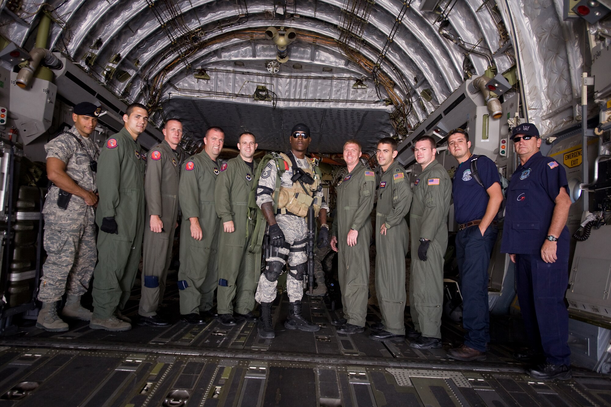 ALTUS AIR FORCE BASE, Okla. -- Members of the 97th Air Mobility Wing pose with actor Tyrese Gibson in the back of a C-17 Globemaster III during filming of "Transformers: Revenge of the Fallen." The aircrew members served as both movie extras and consultants on information pertaining to Air Force aircrew procedures. (Courtesy photo, copyright 2009 Paramount Pictures)