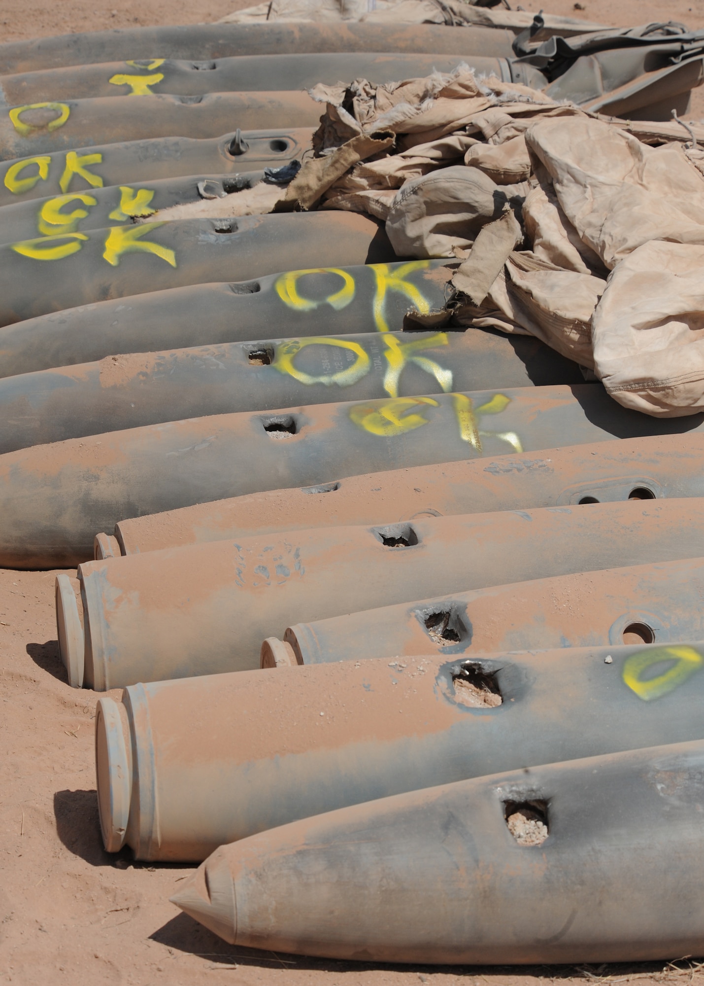 Inert ordnance is collected and destroyed by explosive ordnance disposal specialists from the 49th Civil Engineer Squadron, Holloman Air Force Base, N.M., June 5. Members of Team Holloman are working together to clear old ordnance and munitions at Red Rio Bombing Range 1-30 June. The Red Rio Bombing Range is an active Air Force facility that encompasses approximately 196,000 acres on White Sands Missile Range. (U.S. Air Force photo/Senior Airman Michael Means)