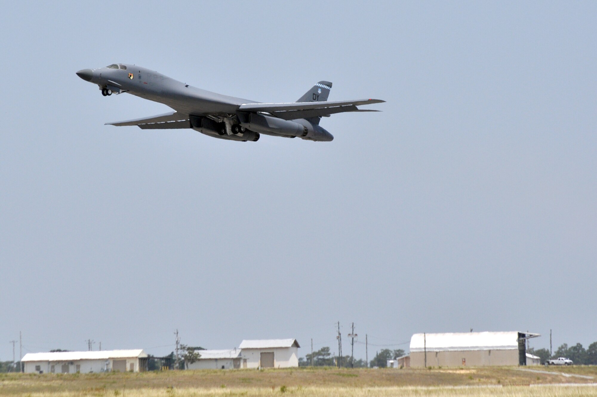 EGLIN AIR FORCE BASE, Fla. --  A B-1B Lancer takes off for its flight back to Dyess, AFB, Texas. The B-1 was piloted by a crew of four, including Col. Mick Guthals, 53rd Wing vice commander. The B-1 was here representing the 337th TES for the assumption-of-command ceremony for the 53rd Wing. It is a long-range, multi-role, heavy bomber capable of speeds of 900-plus miles per hour. Its wingspan fully extended is 137 feet and can fly intercontinental unrefueled. (U.S. Air Force photo/ Airman Anthony Jennings)