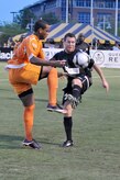 Scott Buete with the Charleston Battery, right, and Nicholas Addlery with the Puerto Rico Islanders, left, fight for control of the ball during the game at Blackbaud Stadium June 25. This is the third game between the two United Soccer League division-one teams within the last week. Charleston Battery shut out the Puerto Rico Islanders 1-0 to take first place in USL-1. (U.S. Air Force photo/Staff Sgt. Marie Cassetty)(RELEASED)