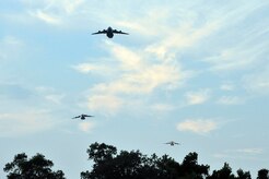 Three Charleston C-17's fly over Blackbaud Stadium as part of the military appreciation night held by the Charleston Battery June 25. This was the first of two military appreciation nights held at Blackbaud Stadium with the second one currently scheduled in September. (U.S. Air Force photo/Staff Sgt. Marie Cassetty)(RELEASED)