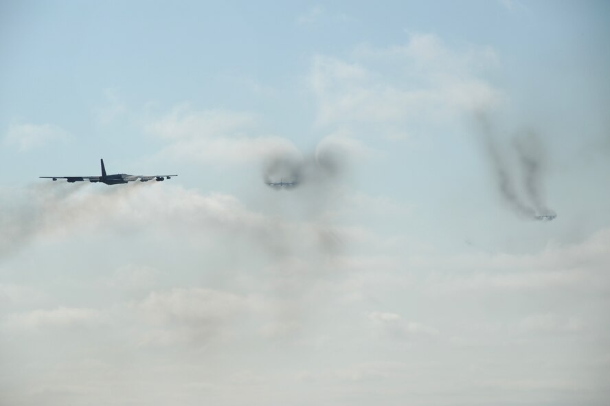 MINOT AIR FORCE BASE ND --  Three B-52H Stratofortresses from here and Barksdale Air Force Base, La., fly off during the rapid launch portion of Global Thunder 09 here June 30. Global Thunder 09 is the USSTRATCOM Field Training Exercise and Battle Staff Exercise designed to exercise all mission areas with primary emphasis on Nuclear Command and Control (NC2). Global Thunder 09 provides training opportunities for component, task force, unit, forces, and command posts to deter, and if necessary defeat, a military attack against the United States and to employ forces as directed by the President. (U.S. Air Force photo by Tech. Sgt. Linda Miller)