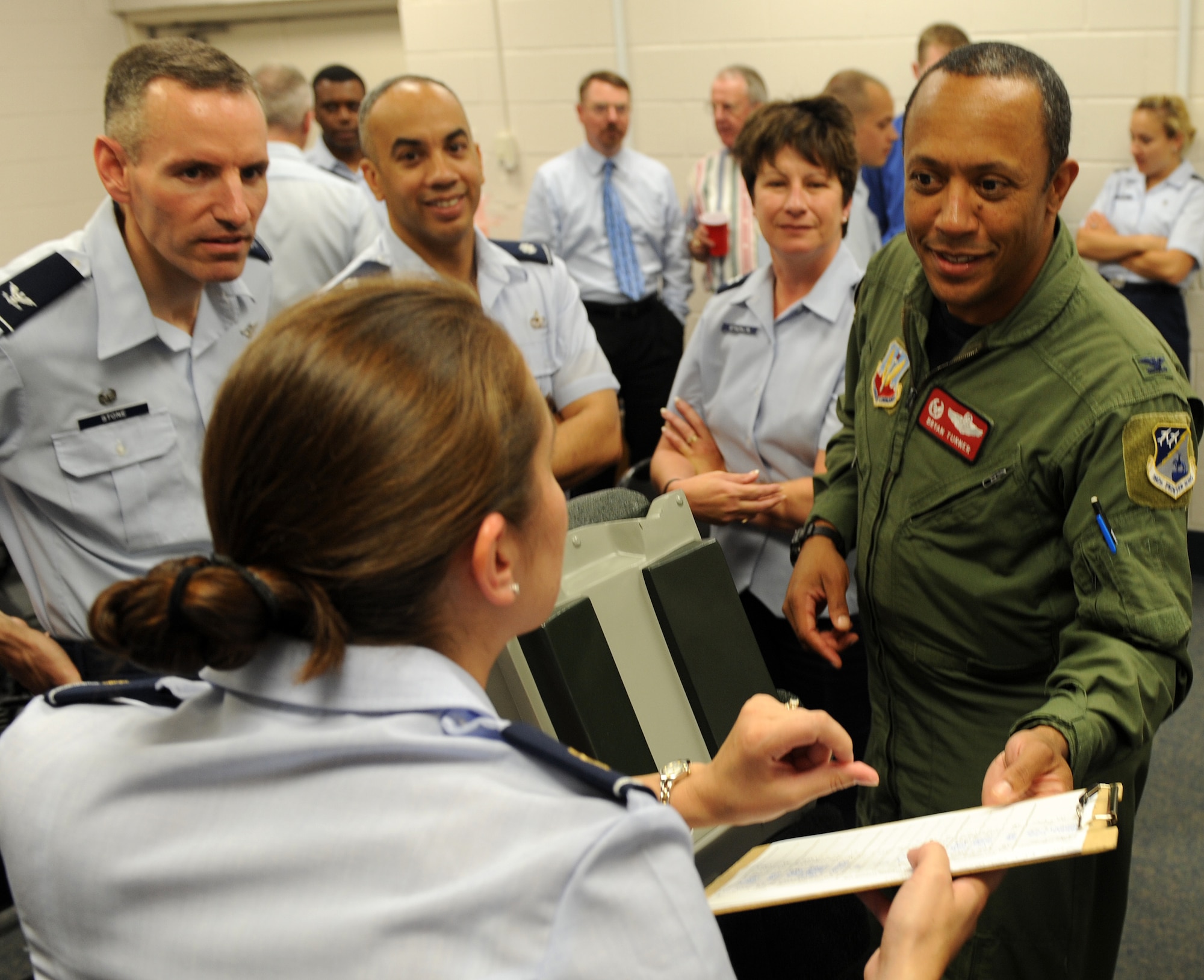 LANGLEY AIR FORCE BASE, Va. --  Maj. Miranda Hancock, 1st Aerospace Medicine Squadron Aerospace Physiology Flight commander, explains Reduced Oxygen Breathing Device test results to Col. Bryan Turner, 192nd Operations Group commander, here June 29.  This test educates pilots on their body's reaction to low oxygen levels in the air.  (U.S. Air Force photo/Senior Airman Zachary Wolf)