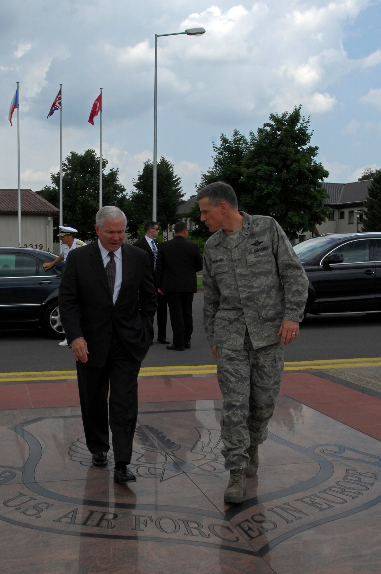 U.S. Air Force Maj. Gen. William Chambers United States Air Forces in Europe vice commander, talks with Secretary of Defense Robert M. Gates before his departure, June 30, 2009, Ramstein Air Base, Germany. Secretary Gates arrived at Ramstein en route to Landstuhl Regional Medical Center, Germany to visit wounded U.S. military members being treated there. (U.S. Air Force photo by Senior Airman Kenny Holston)