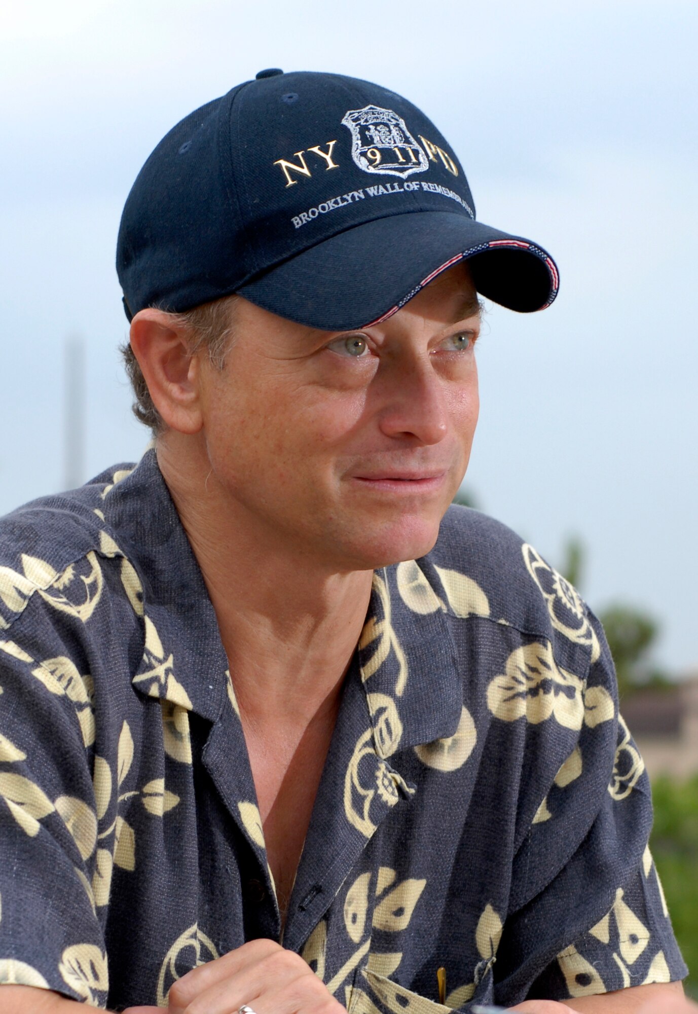 Gary Sinise of "The Lt. Dan Band" brought his band to Osan Air Base, Republic of Korea, June 28. The band played for a standing room only crowd at the base theater. The band's mission is to do what it can to draw attention to military service members, their families and veterans and to make sure they know they are remembered and appreciated. (U.S. Air Force photo/Staff Sgt. Brian Ferguson)
