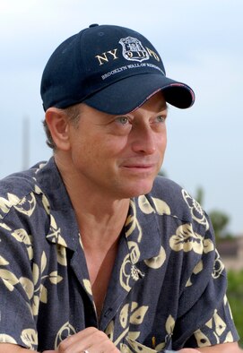 Gary Sinise of "The Lt. Dan Band" brought his band to Osan Air Base, Republic of Korea, June 28. The band played for a standing room only crowd at the base theater. The band's mission is to do what it can to draw attention to military service members, their families and veterans and to make sure they know they are remembered and appreciated. (U.S. Air Force photo/Staff Sgt. Brian Ferguson)