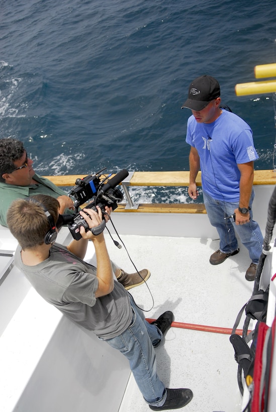 Staff Sgt. Zachary Mott, Drill Instructor, Company C, is filmed sending a shout out to his family for the show Sport Fishing with Dan Hernandez.