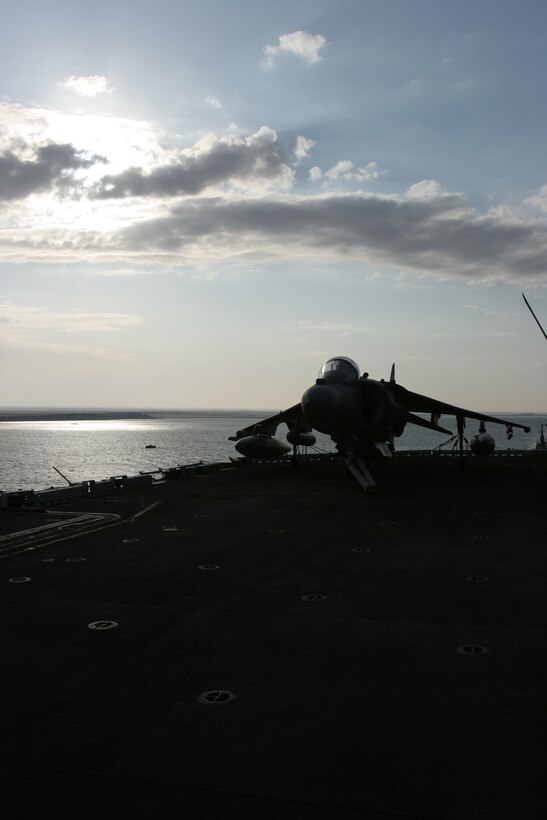 An AV-8B Harrier II of Marine Medium Helicopter Squadron-264 (REIN), 26th Marine Expeditionary Unit, is parked on the flight deck of the USS Iwo Jima (LHD-7) during the transit through the Suez Canal, March 1, 2009. The transit marks the USS Iwo Jima's departure from the Fifth Fleet Area of Operations to the Sixth Fleet Area of Operations.