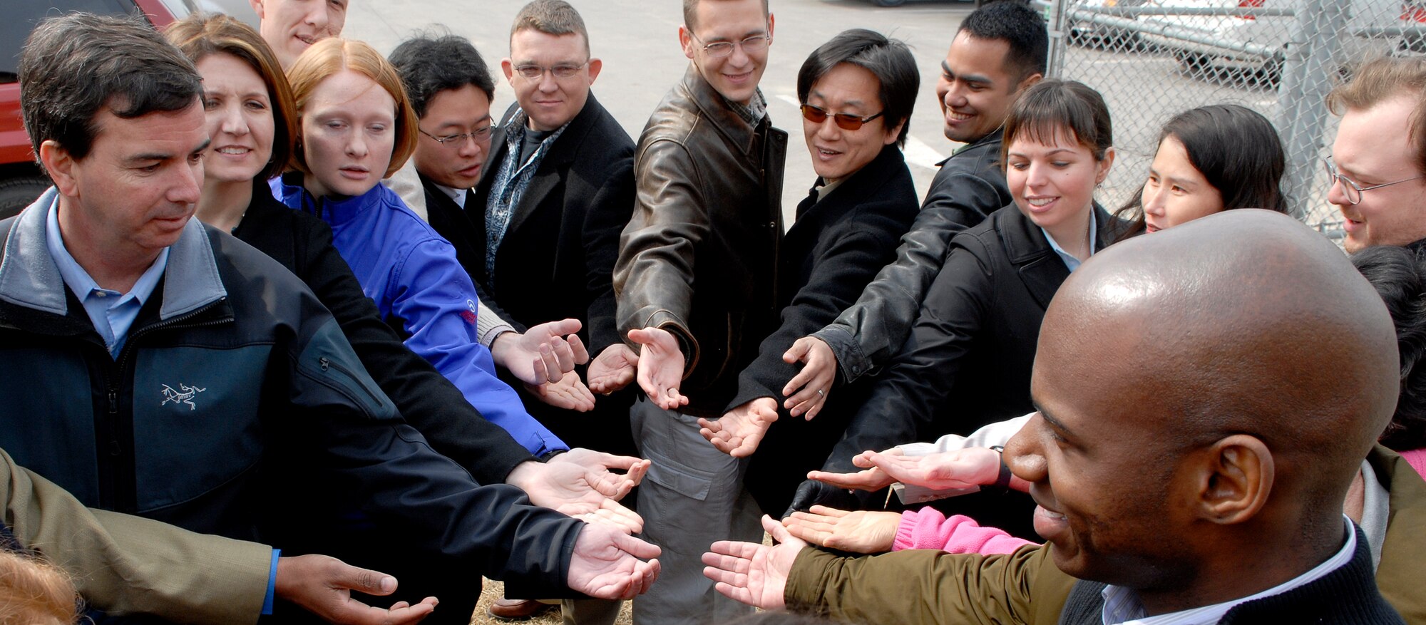 Students of “The Seven Habits of Highly Effective People” perform an exercise designed to show how working as a team can be more beneficial at Osan Air Base, Republic of Korea Feb. 25.  The seven-habits class helps students develop a better understanding of who they are, and gives them principles that can help them to succeed and lead.  (U.S. Air Force Photo/Staff Sgt. Brian Ferguson)