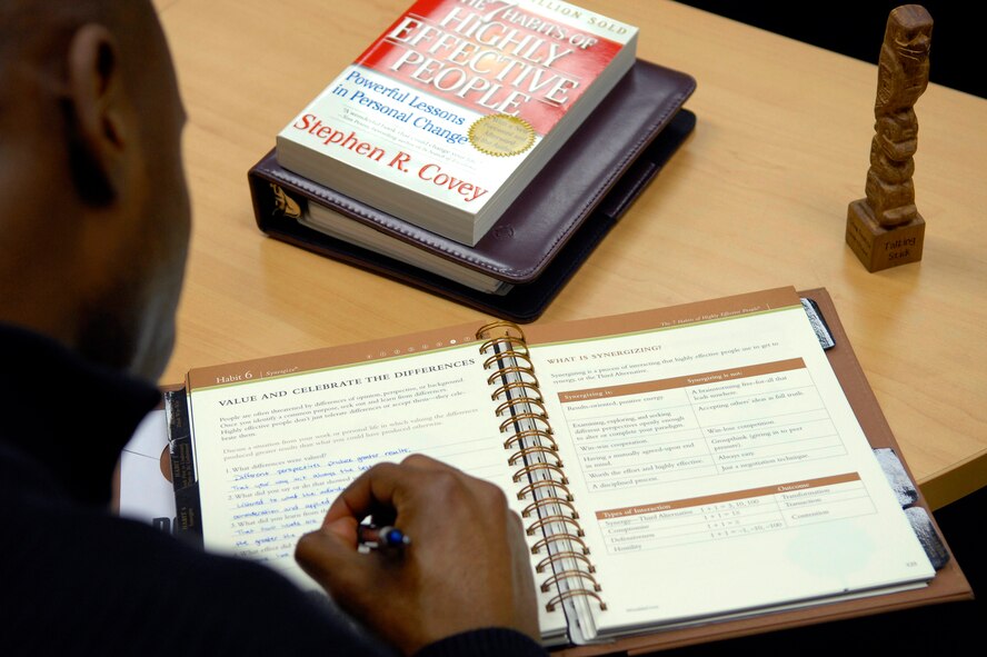 Capt. Alton Stephens works in his “Seven Habits of Highly Effective People” workbook after watching a video on the benefits of diversity and differences at Osan Air Base, Republic of Korea Feb. 25. The seven-habits class helps students develop a better understanding of who they are, and gives them principles that can help them to succeed and lead.  Capt. Stephens is a flight commander with the 51st Services Squadron.  (U.S. Air Force Photo/Staff Sgt. Brian Ferguson)