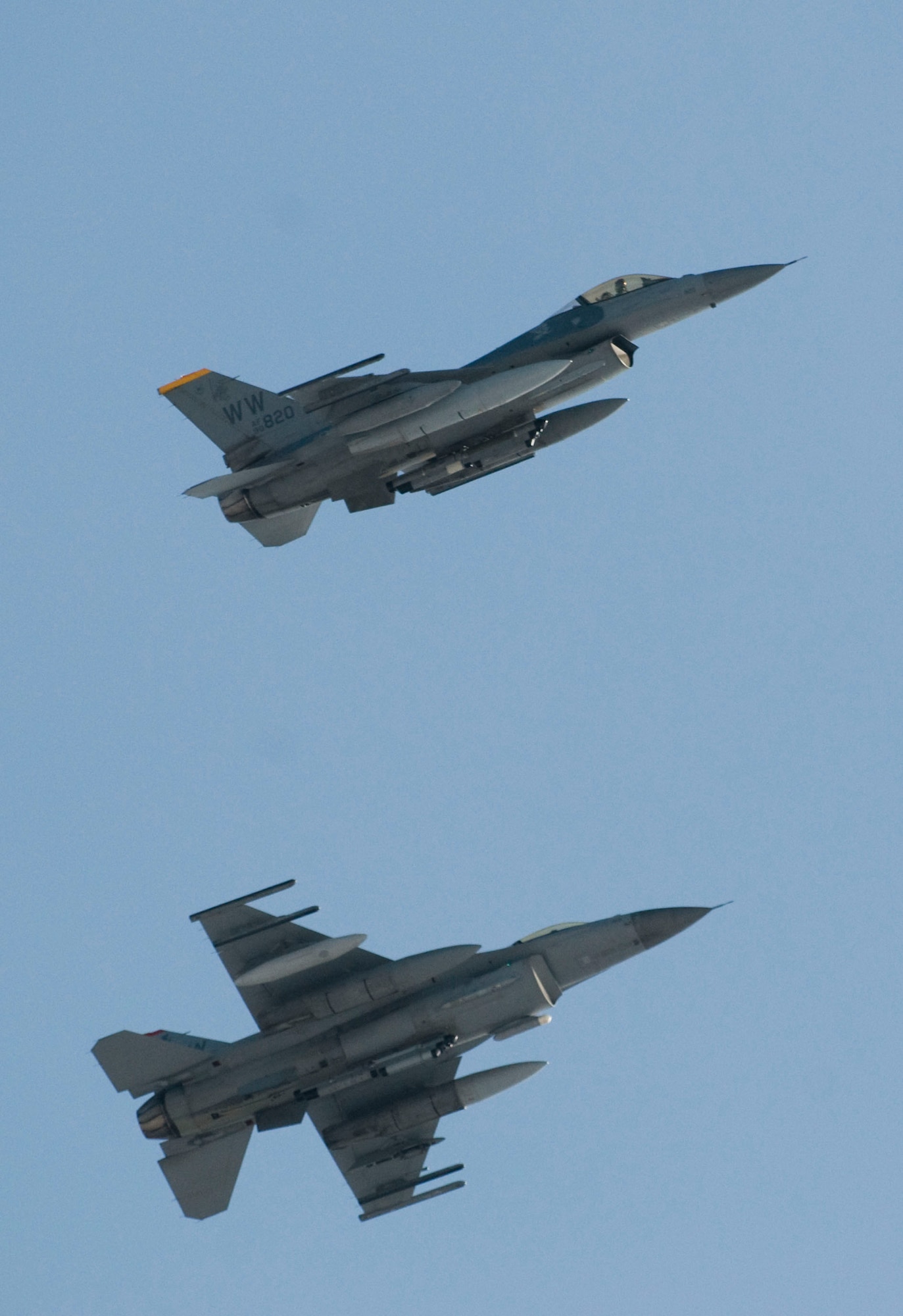 MISAWA AIR BASE, Japan - A jet breaks formation during its final approach to land Feb. 27, 2009. The returning F-16s performed a low-altitude formation fly-by to signal their return. (U.S. Air Force photo by Staff Sgt. Samuel Morse)