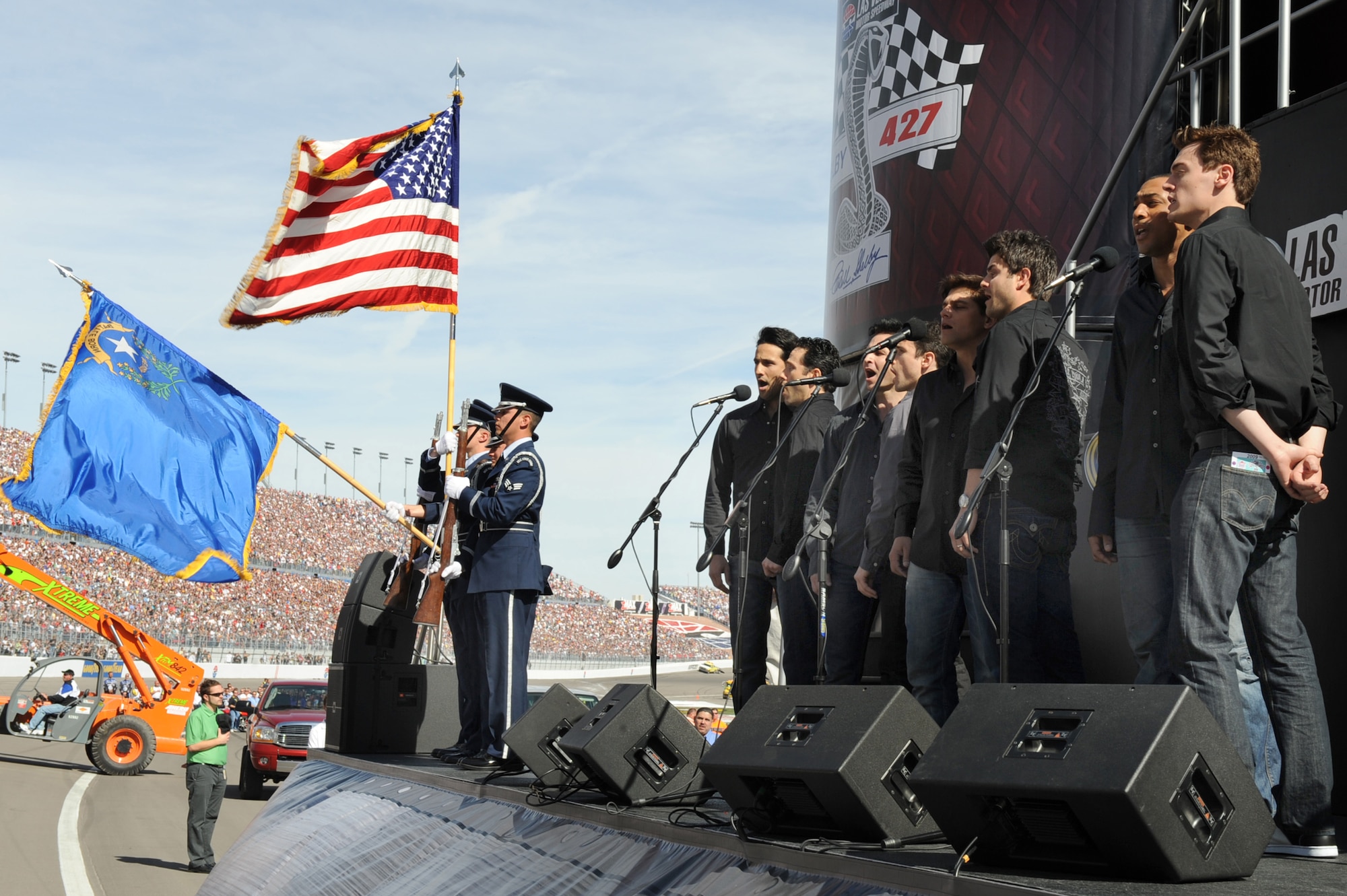 NELLIS AIR FORCE BASE, Nev -- The Nellis Air Force Base honor guard presents the colors during the National Anthem before the Shelby 427 Sprint Cup race at the Las Vegas Motor Speedway March 1. The National Anthem was sung by the cast of the Tony Award winning musical The Jersey Boys.
(U.S Air Force Photo by Airman 1st Class Stephanie Rubi (RELEASED)