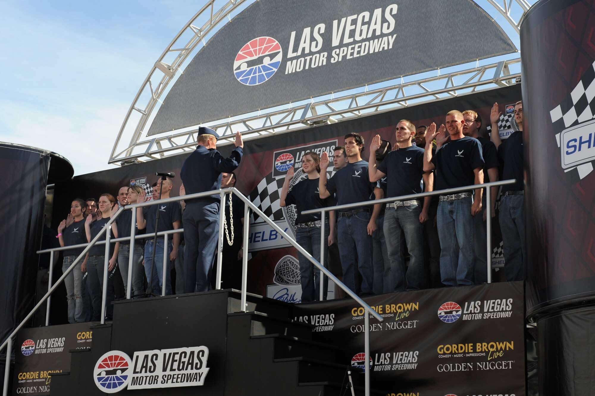 NELLIS AIR FORCE, Nev.-- Lt. Gen. Ronald Sams, the U.S. Air Force Inspector General, administers the oath of enlistment to a group of Air Force recruits at the Las Vegas Motor Speedway prior to the Shelby 427 Sprint Cup race March 1. The Air Force recruits are part of the delayed entry program in the Las Vegas area. 
(U.S Air Force Photo by Airman 1st Class Stephanie Rubi (RELEASED)