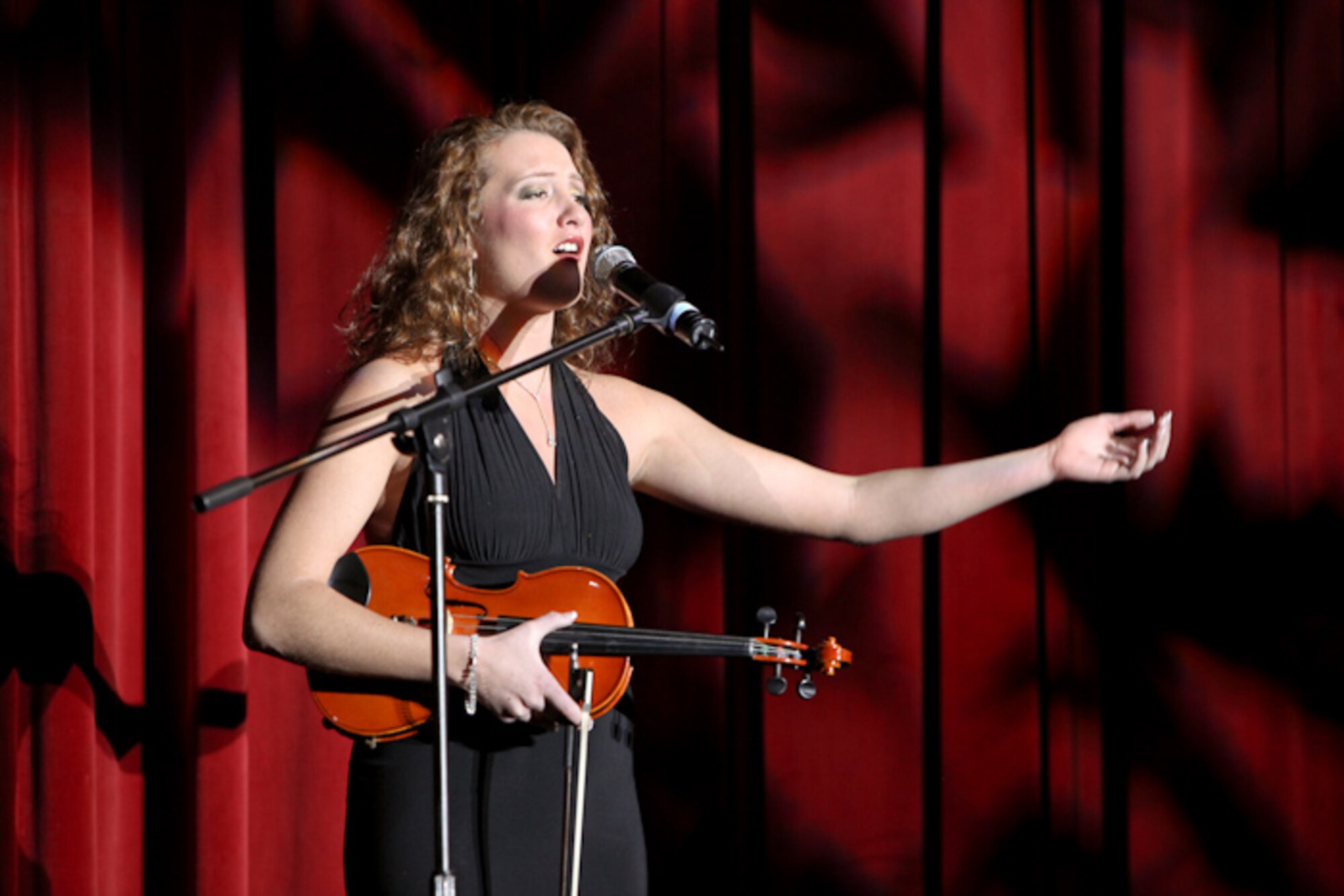 Airman 1st Class Sheila Smith, 3rd Equipment Maintainence Squadron, performs for the Tops in Blue worldwide talent search in San Antonio. (U.S. Air Force photo)