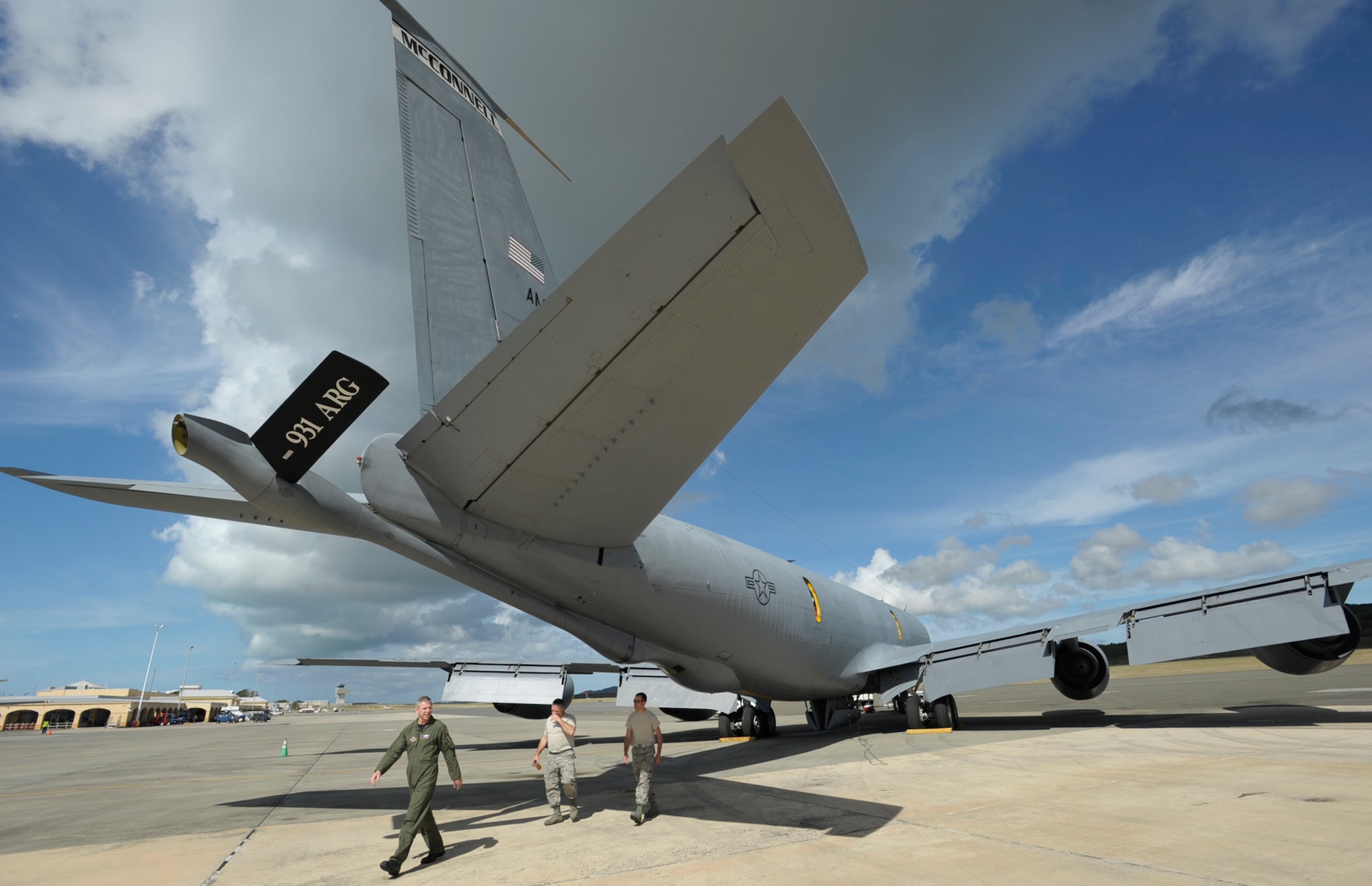 Master Sgt. Paul McGinnis and Senior Airman Alan Cooper (at right) follow Lt. Col. Keith Kontz while inspecting a KC-135 Stratotanker before departing from St. Croix, U.S. Virgin Islands on March 1. Aeromedical evacuation training missions to St. Croix allow pilots to complete overseas training requirements. Colonel Kontz is a Reserve KC-135 pilot assigned to the 18th Air Refueling Squadron, the flying unit of the 931st Air Refueling Group at McConnell Air Force Base, Kan. Both Sergeant McGinnis and Airman Cooper are Reservists assigned to the 931st Aircraft Maintenance Squadron. (U.S. Air Force photo/Tech. Sgt. Jason Schaap)