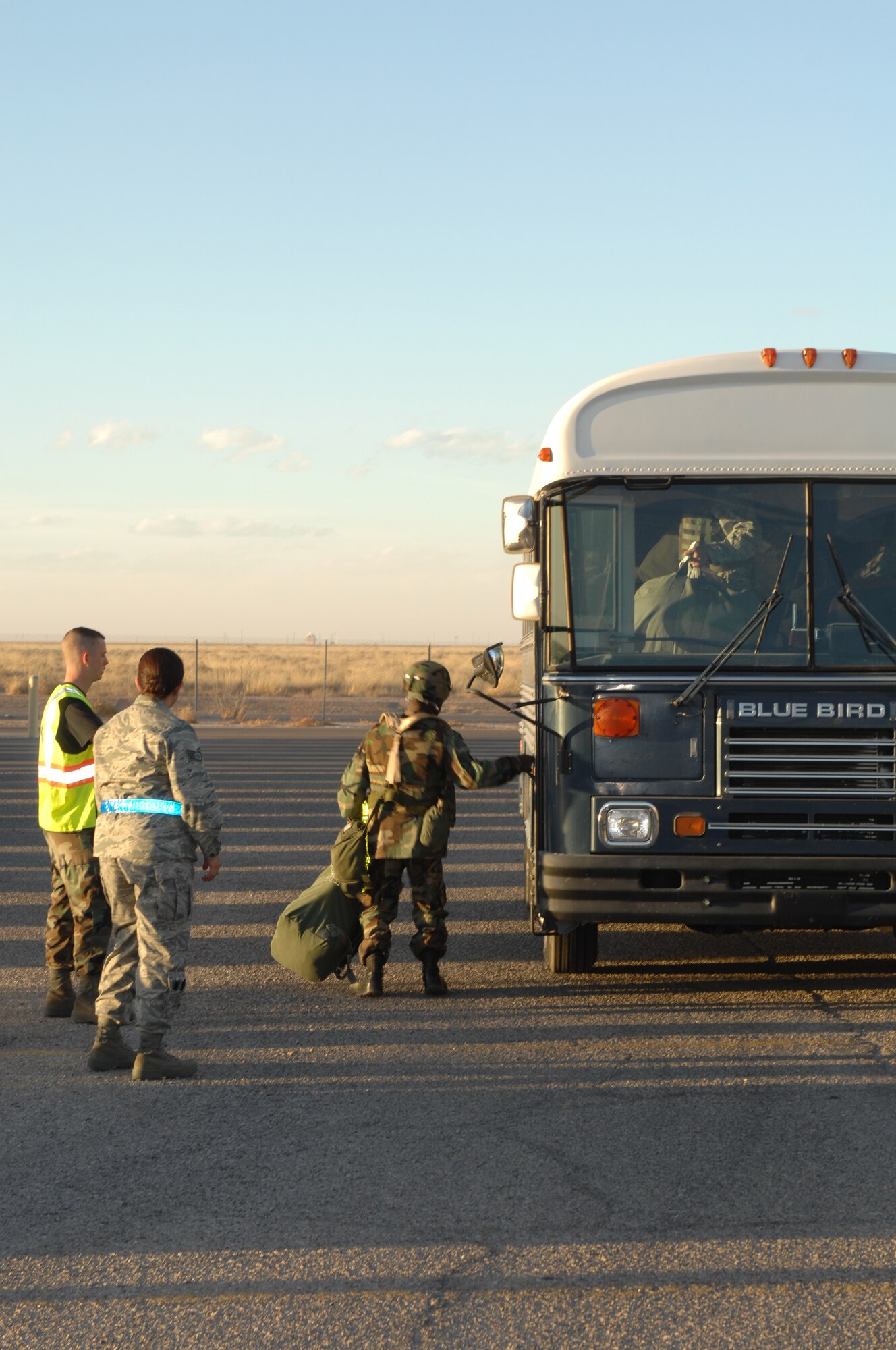Airmen arrive at the Holloman Air Force Base deployment control center during the recent Phase I Exercise at Holloman Air Force Base, N.M. The Airmen will receive their final deployment briefings before simulating leaving for Anderson Air Base, Guam. (U.S Air Force photo/Senior Airman Russell Scalf)

