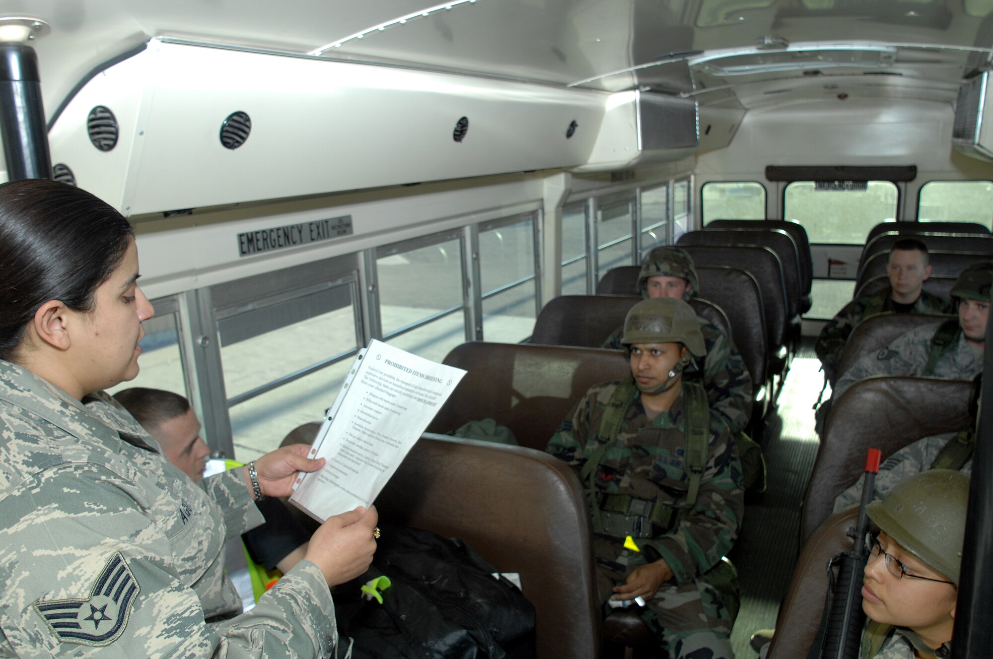 Staff Sergeant Roxanna Aguilar gives a prohibited item briefing during the Phase I Exercise at Holloman Air Force Base, N.M. The briefing informs Airmen about items considered prohibited and gives them instructions on how to dispose of any such items. This is part of their final deployment briefings before simulating leaving for Anderson Air Base, Guam. (U.S Air Force photo/Senior Airman Russell Scalf)
