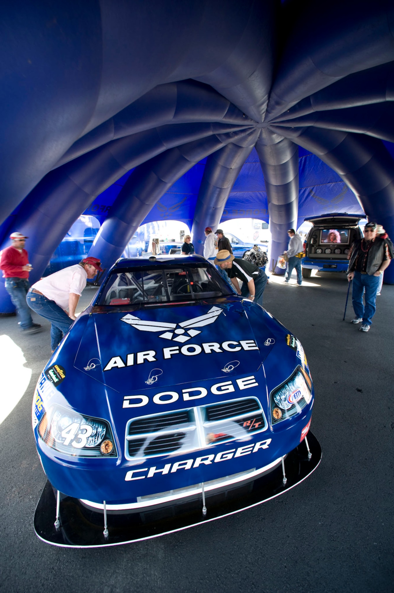 Race fans view the new Air Force sponsored No. 43 Dodge Feb. 28 at the Las Vegas Motor Speedway in Nevada. The Air Force paint scheme will be on the track in 2009 at Dover International Speedway, Del., Talledega Superspeedway, Ala., Daytona International Speedway, Fla., and Lowes Motor Speedway in Charlotte, N.C.  (U.S. Air Force photo/Master Sgt. Jack Braden)