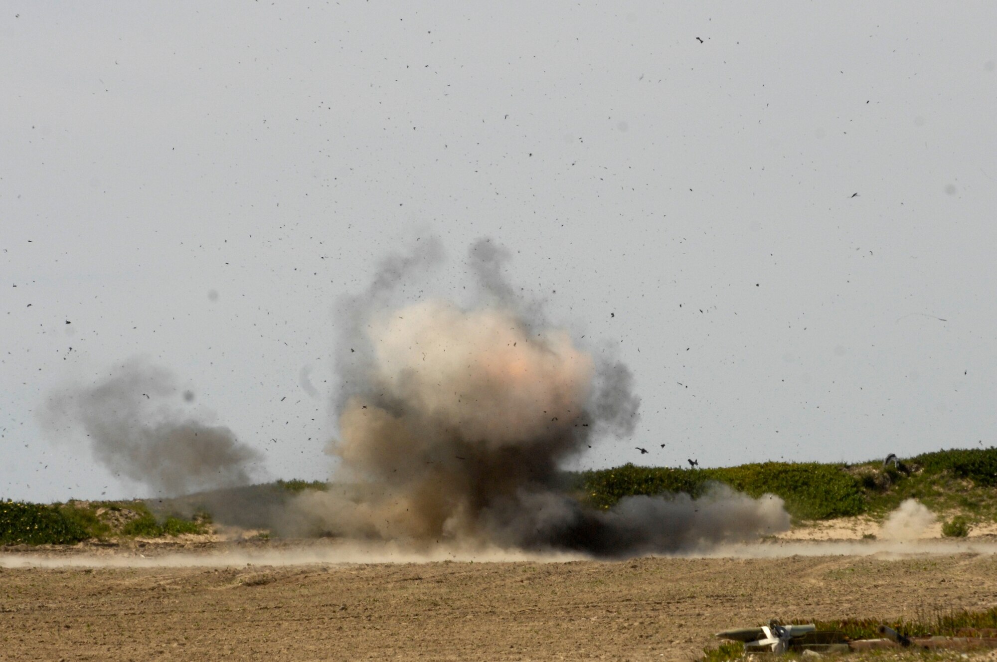 VANDENBERG AIR FORCE BASE, Calif. -- Explosive ordinance disposal technicians from the 30th Civil Engineer Squadron detonate a suitcase with a ball of C4 explosive during an explosive ordnance awareness course with members with the Transportation Security Administration from various airports in the Santa Barbara County area Feb 27 here.(U.S. Air Force photo/Senior Airman Matthew Plew)  