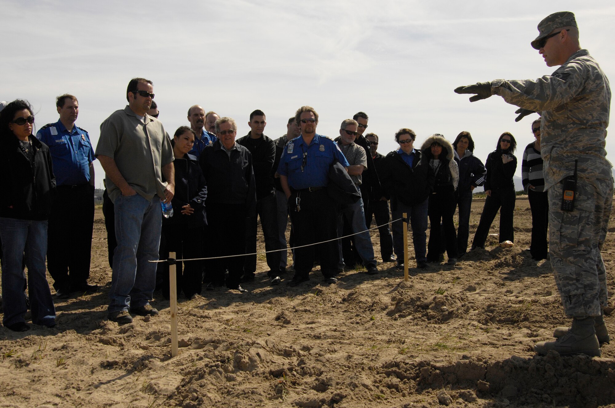 VANDENBERG AIR FORCE BASE, Calif. -- Tech. Sgt. Robert Brown, 30th Engineer Squadron explosive ordnance technician, explains how fast a 10 ft. piece of detonation chord will burn once it has been ignited during an explosive ordnance awareness course with members with the Transportation Security Administration from various airports in the Santa Barbara County area Feb 27 here.(U.S. Air Force photo/Senior Airman Matthew Plew) 